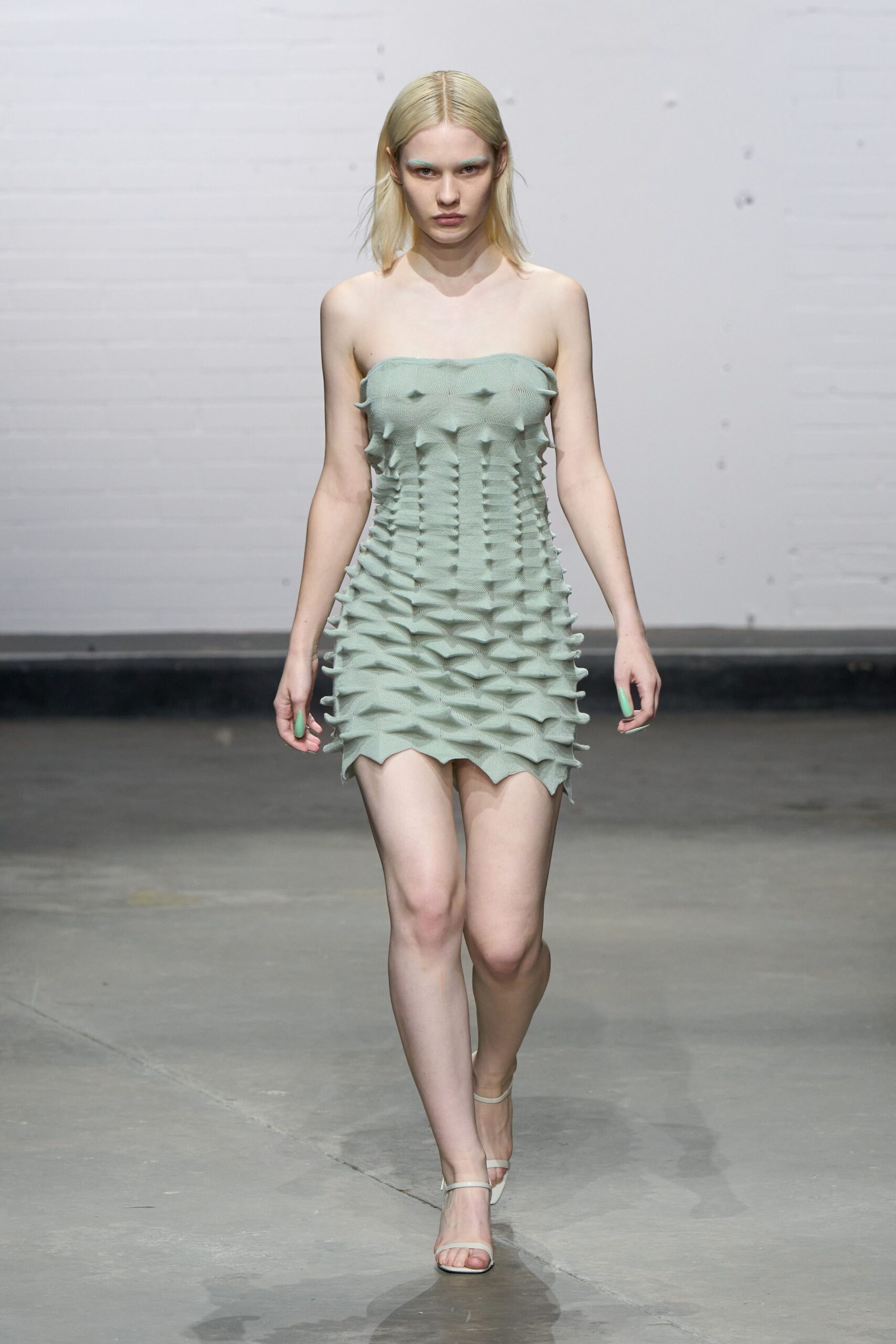 green neoprene strapless fitted pleated mini dress