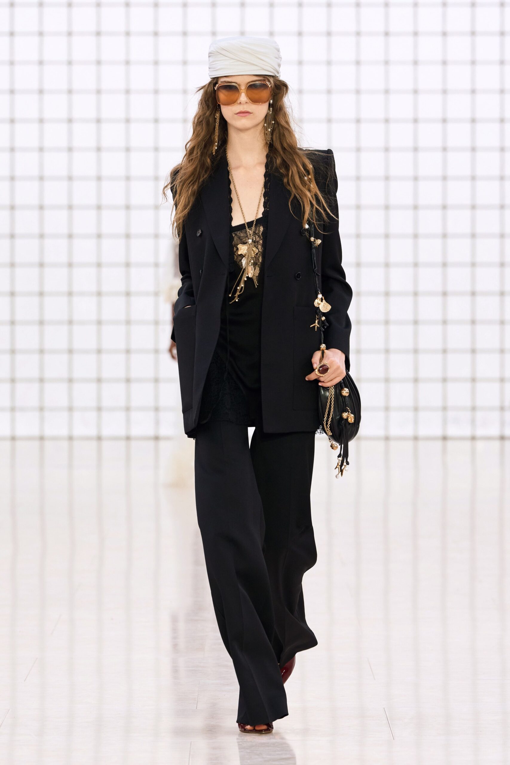black tailored blazer with red heels