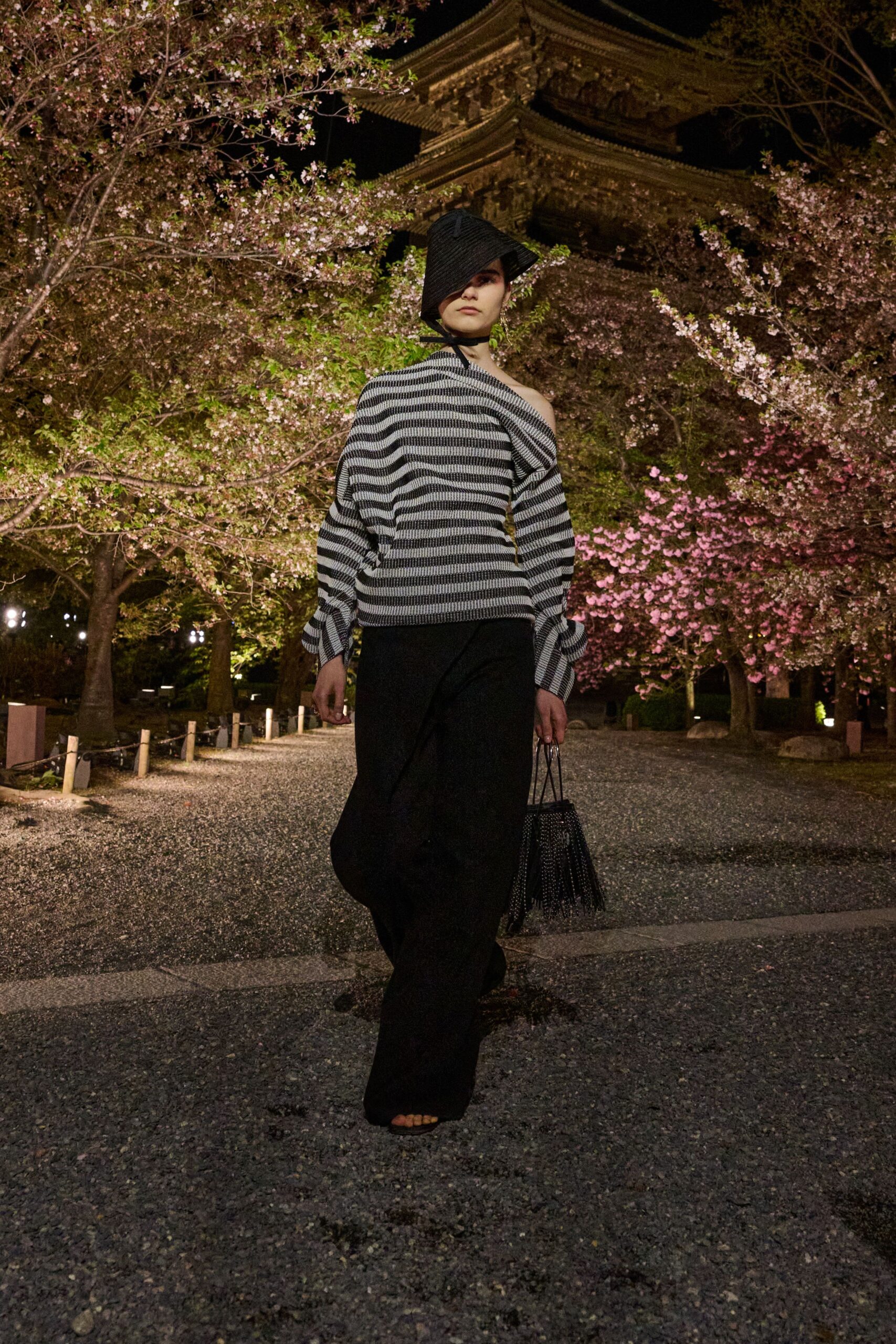 black and white striped top with wide-leg pants