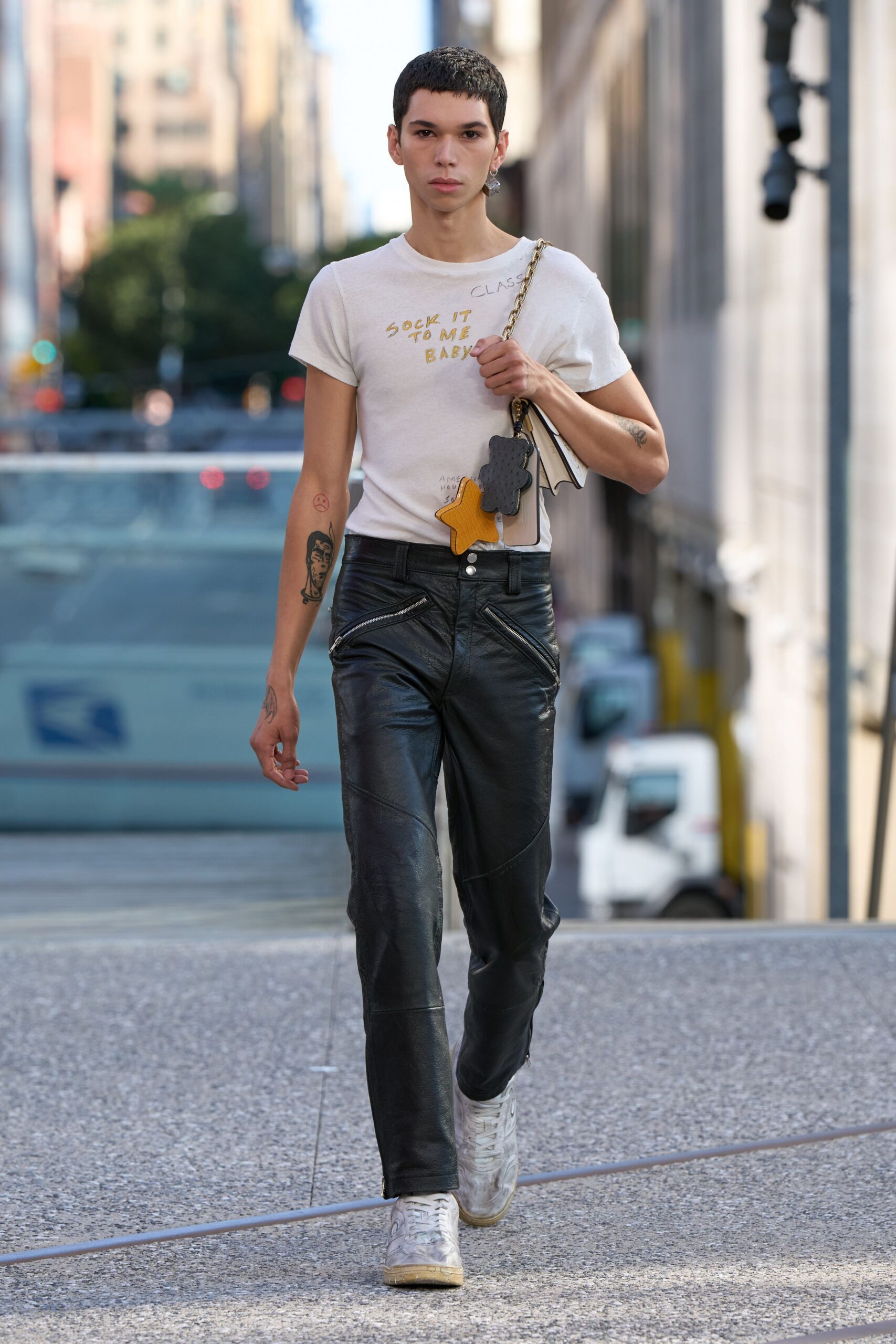 white cotton t-shirt with black leather pants