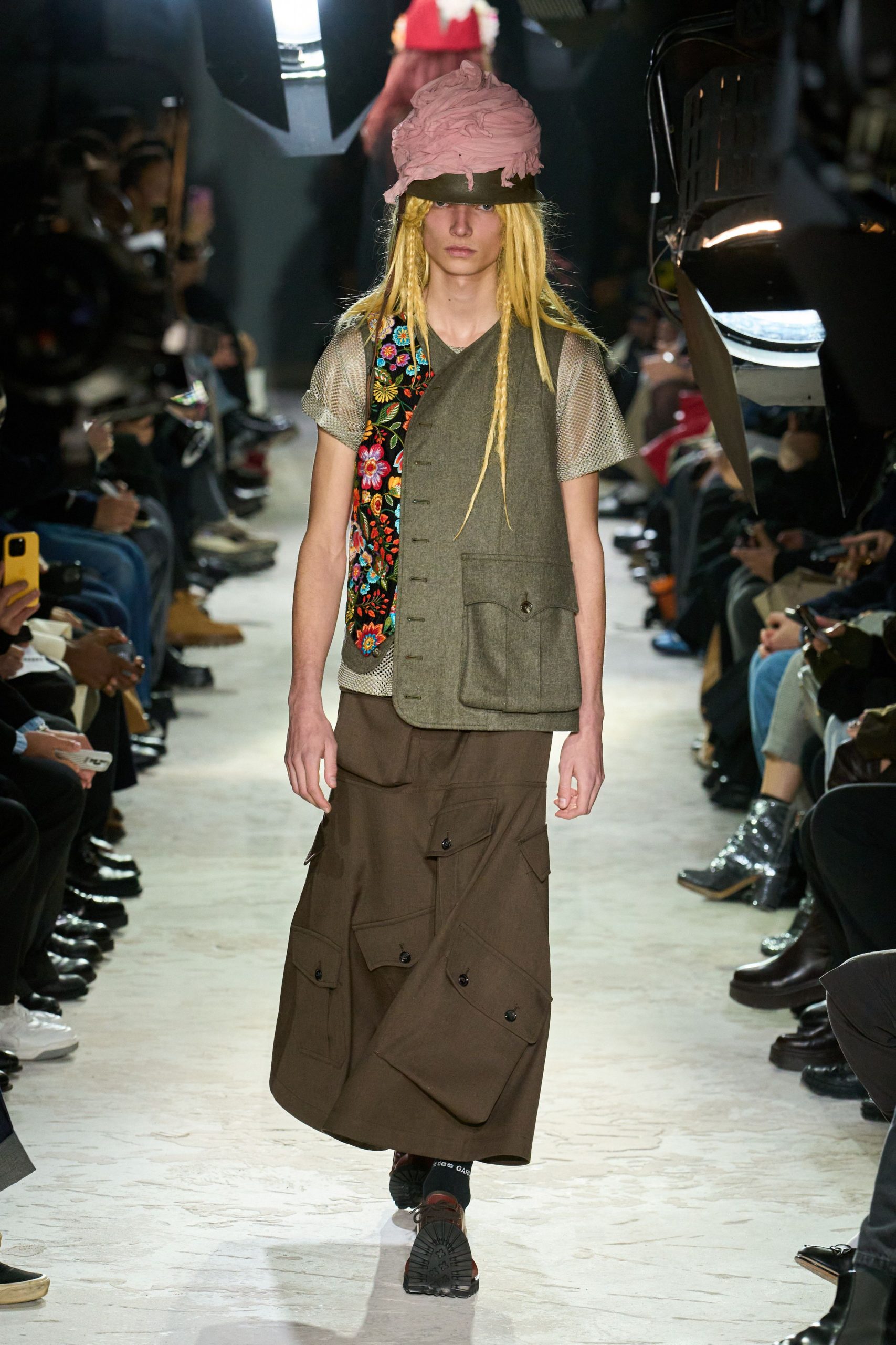 gray top olive vest brown skirt