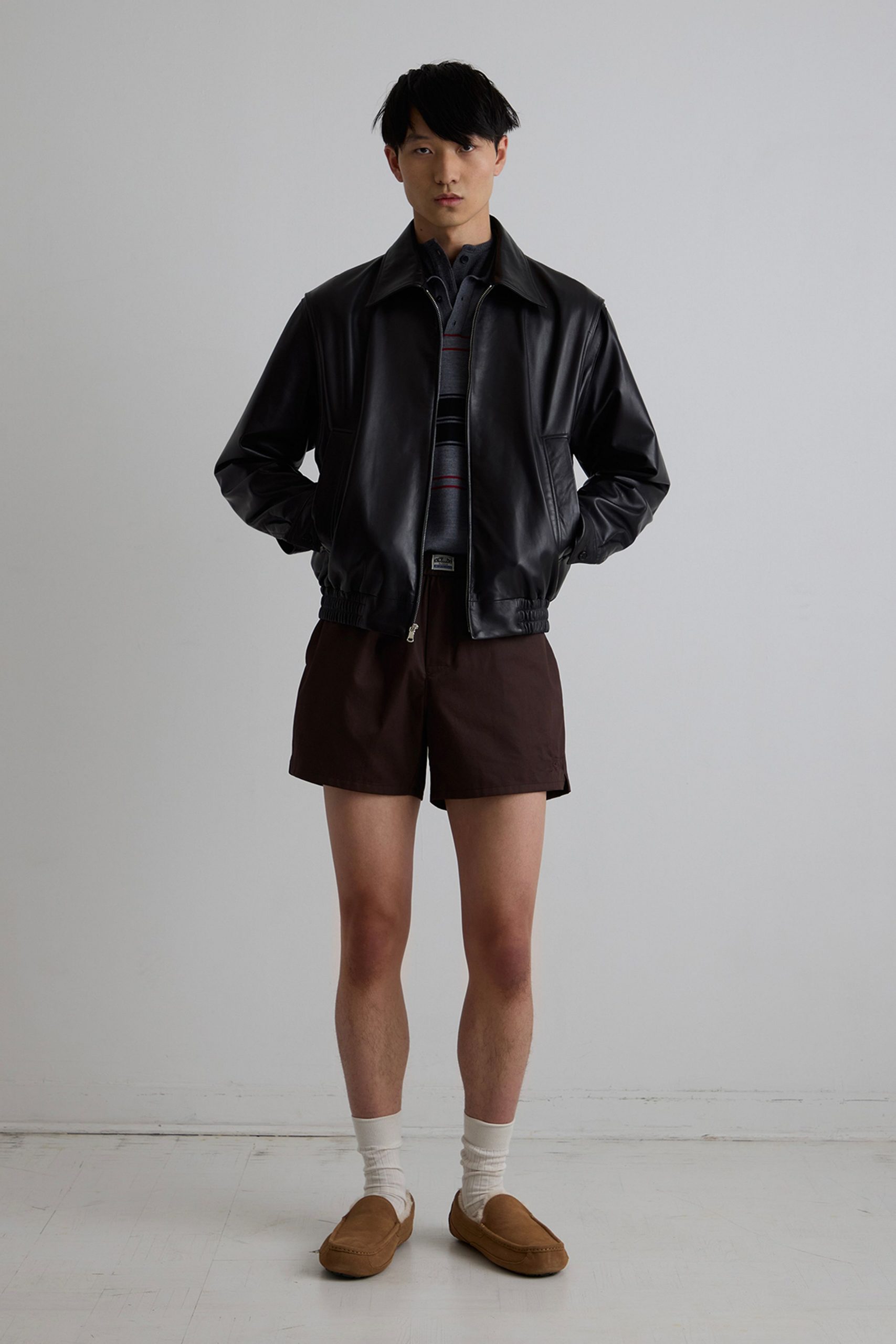 black leather jacket brown shorts