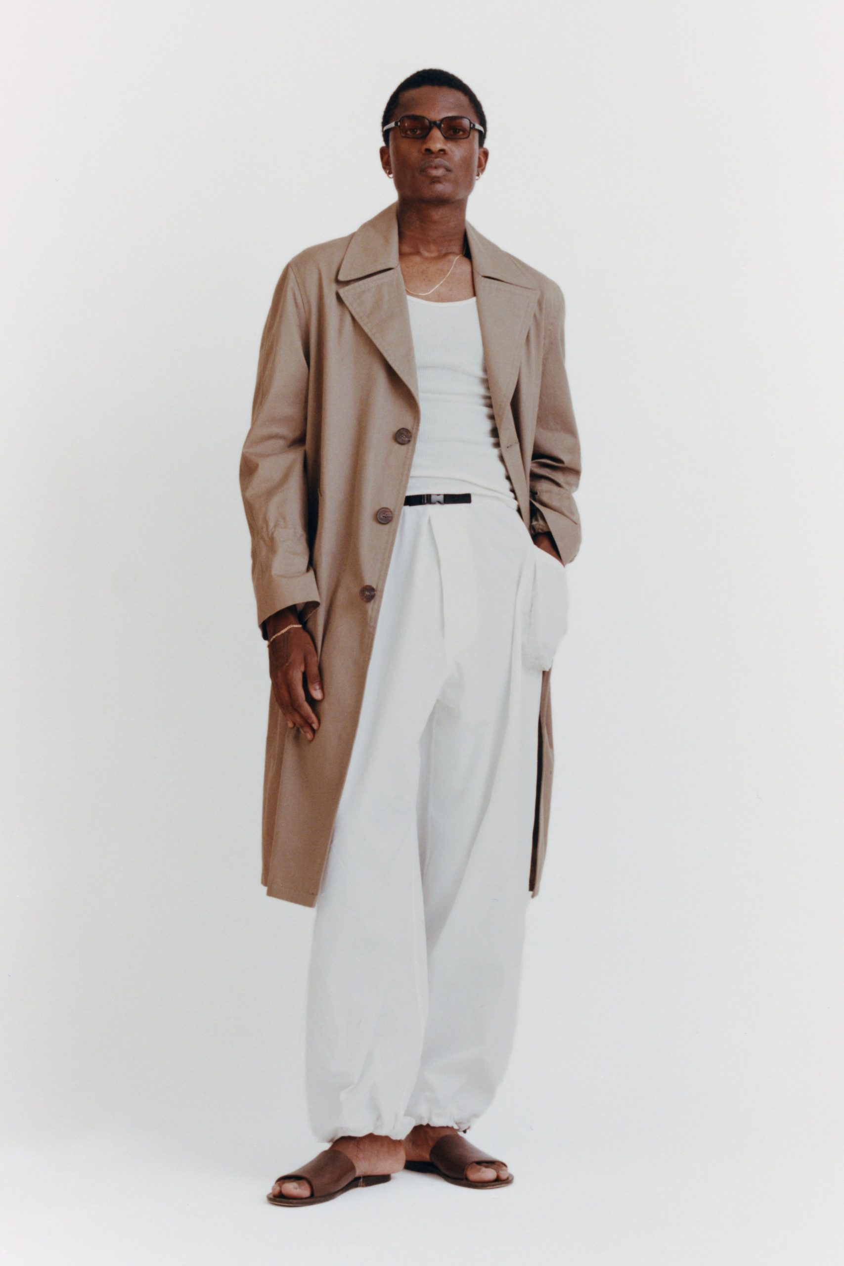 beige coat with white tank-top