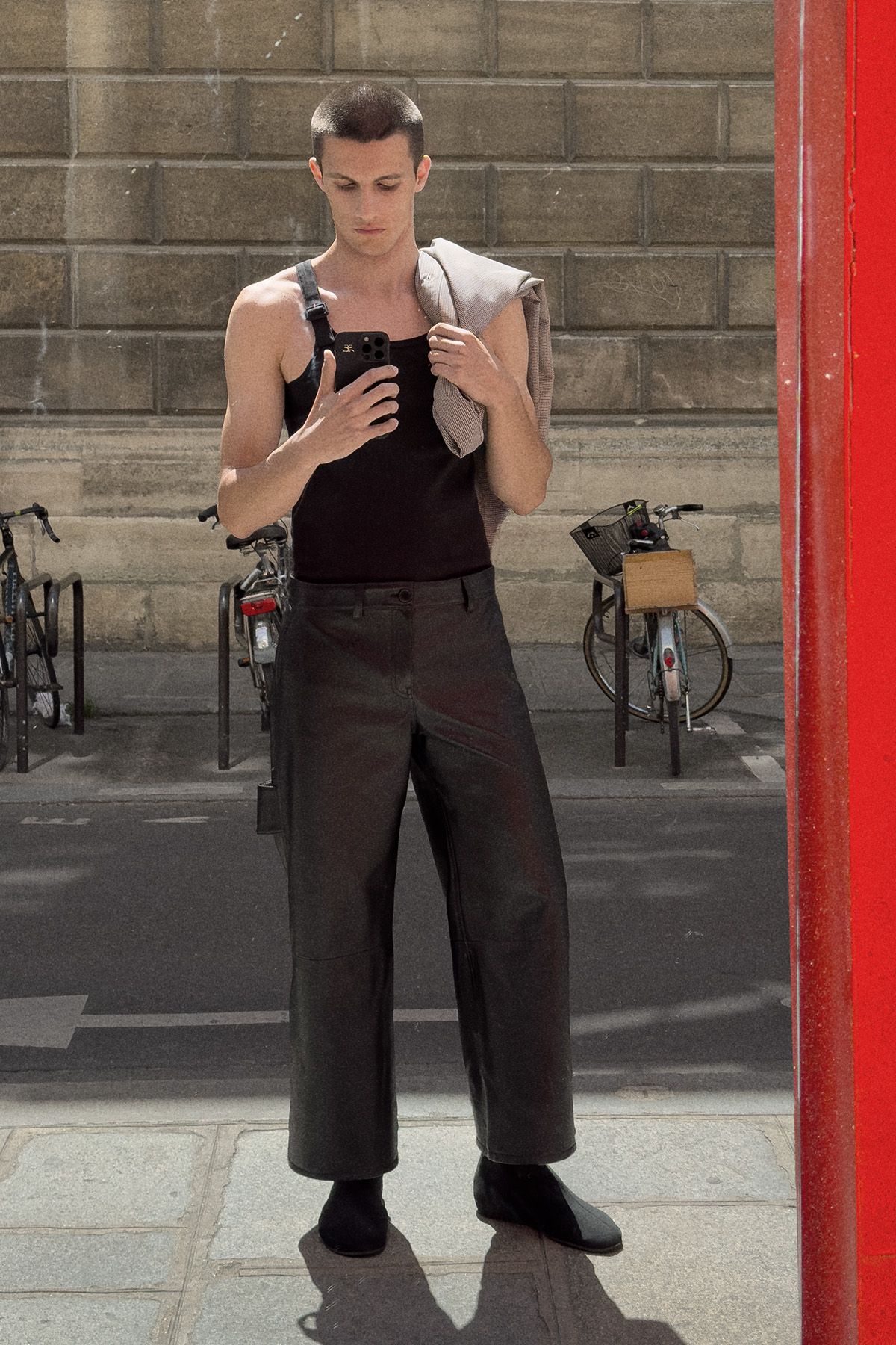 black tank-top and leather pants