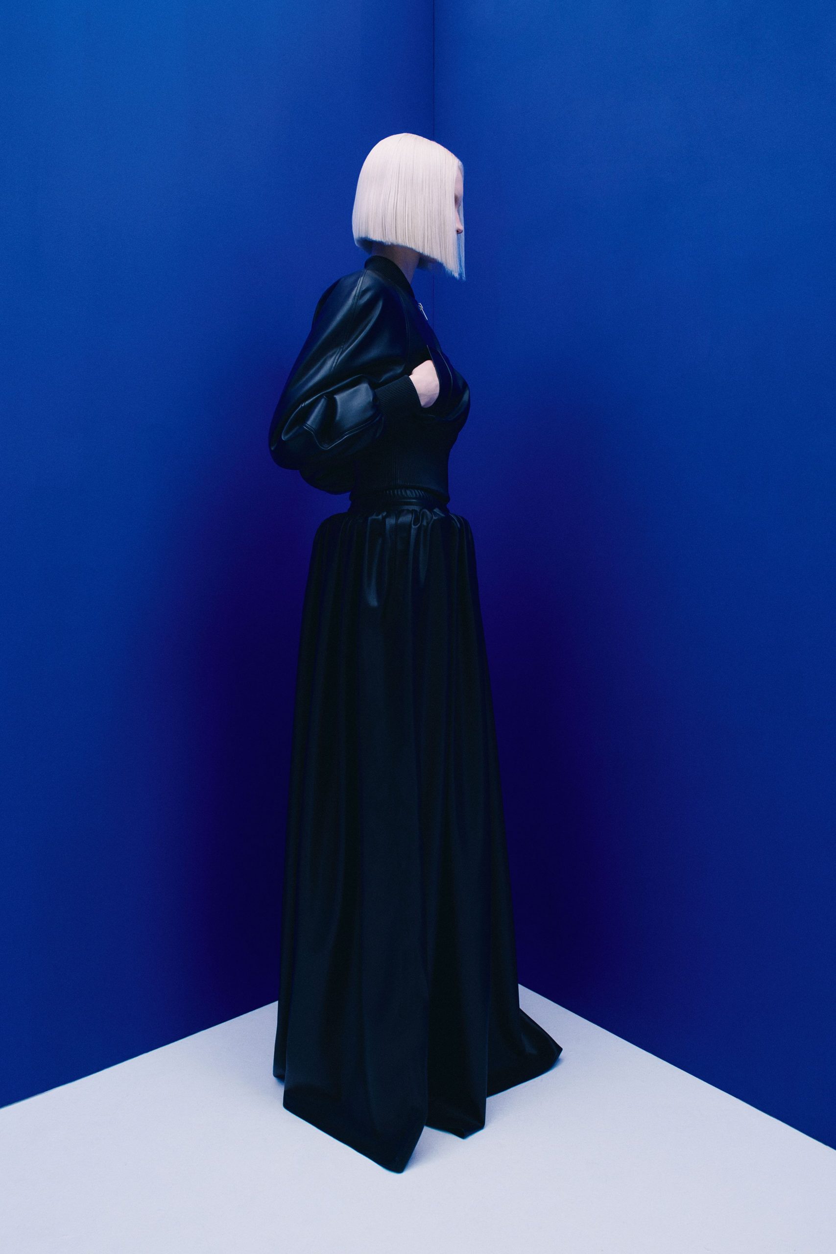 black leather long-sleeve gown