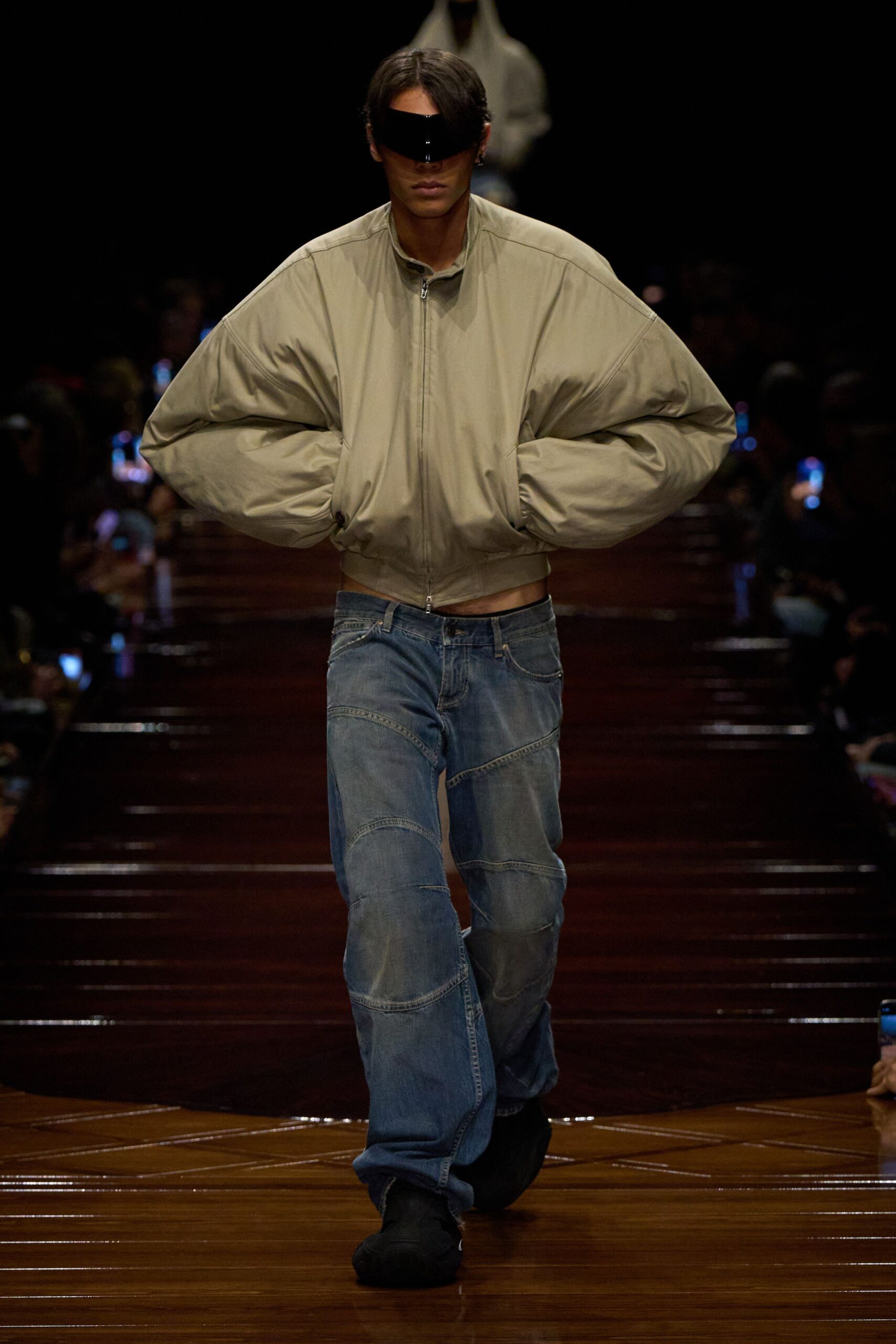 beige oversized jacket with blue jeans