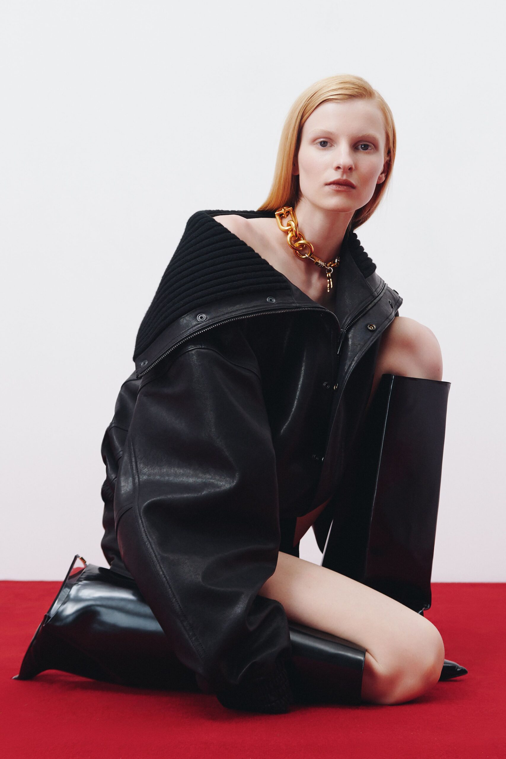 black leather long-sleeve high-neck oversized zippered quilted coat