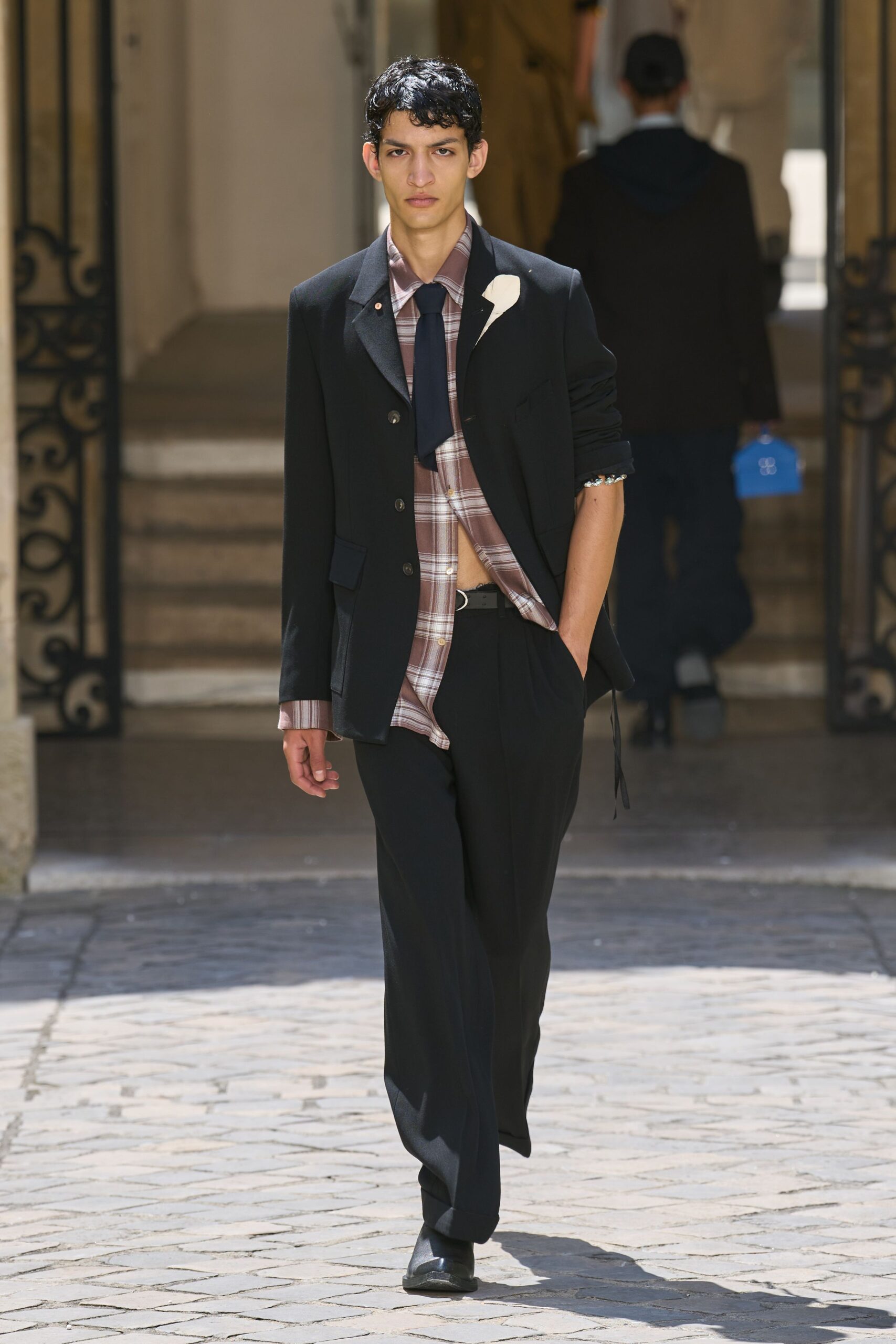 black tailored suit with plaid shirt