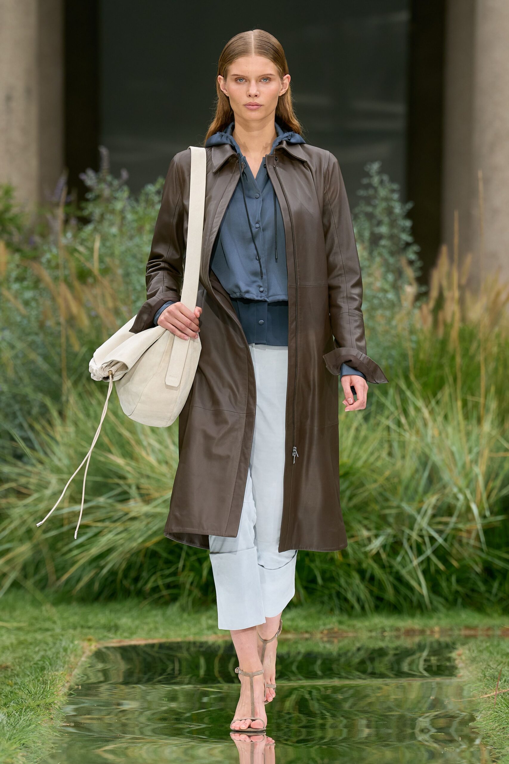 brown leather coat with blue shirt