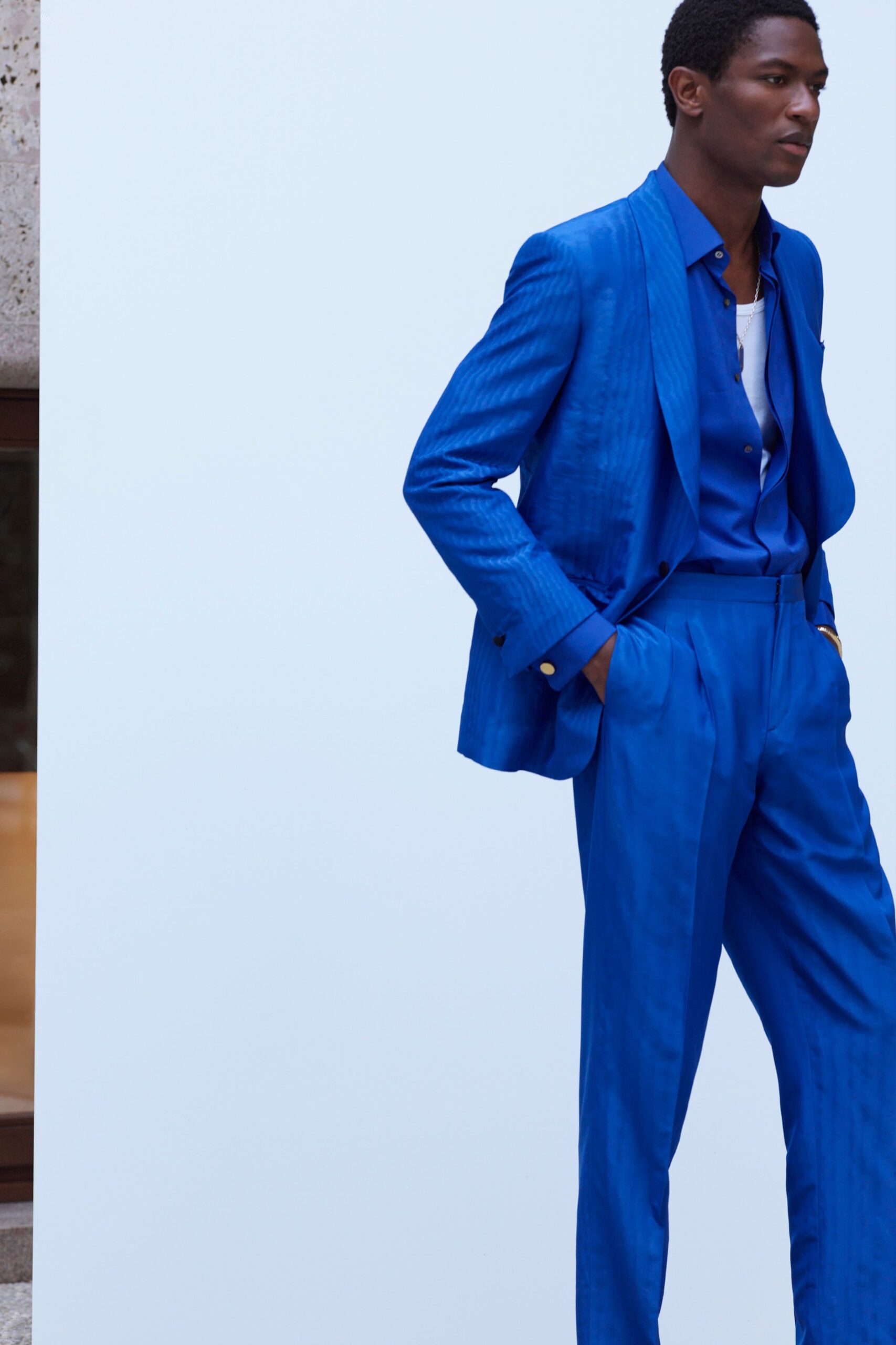 blue tailored suit with tank-top