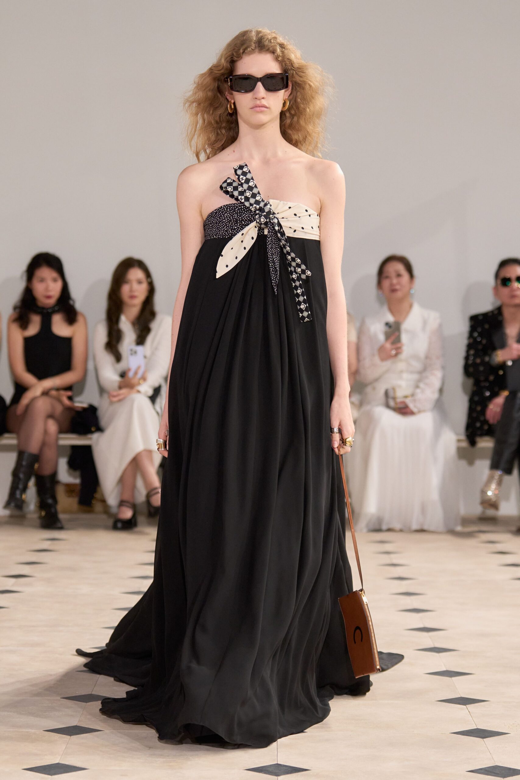black strapless flowing gown
