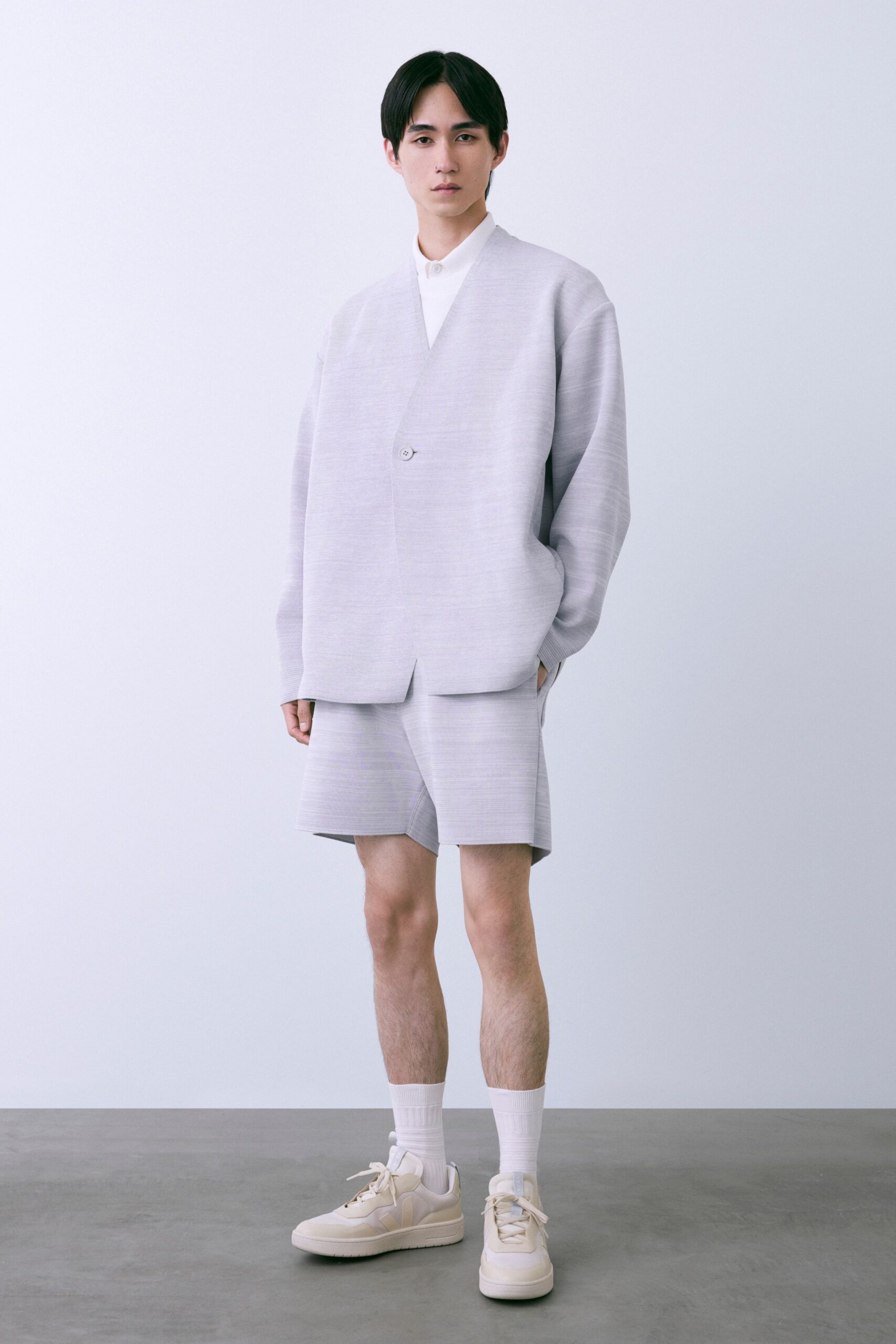 white wool long-sleeve v-neck oversized buttoned pockets jacket