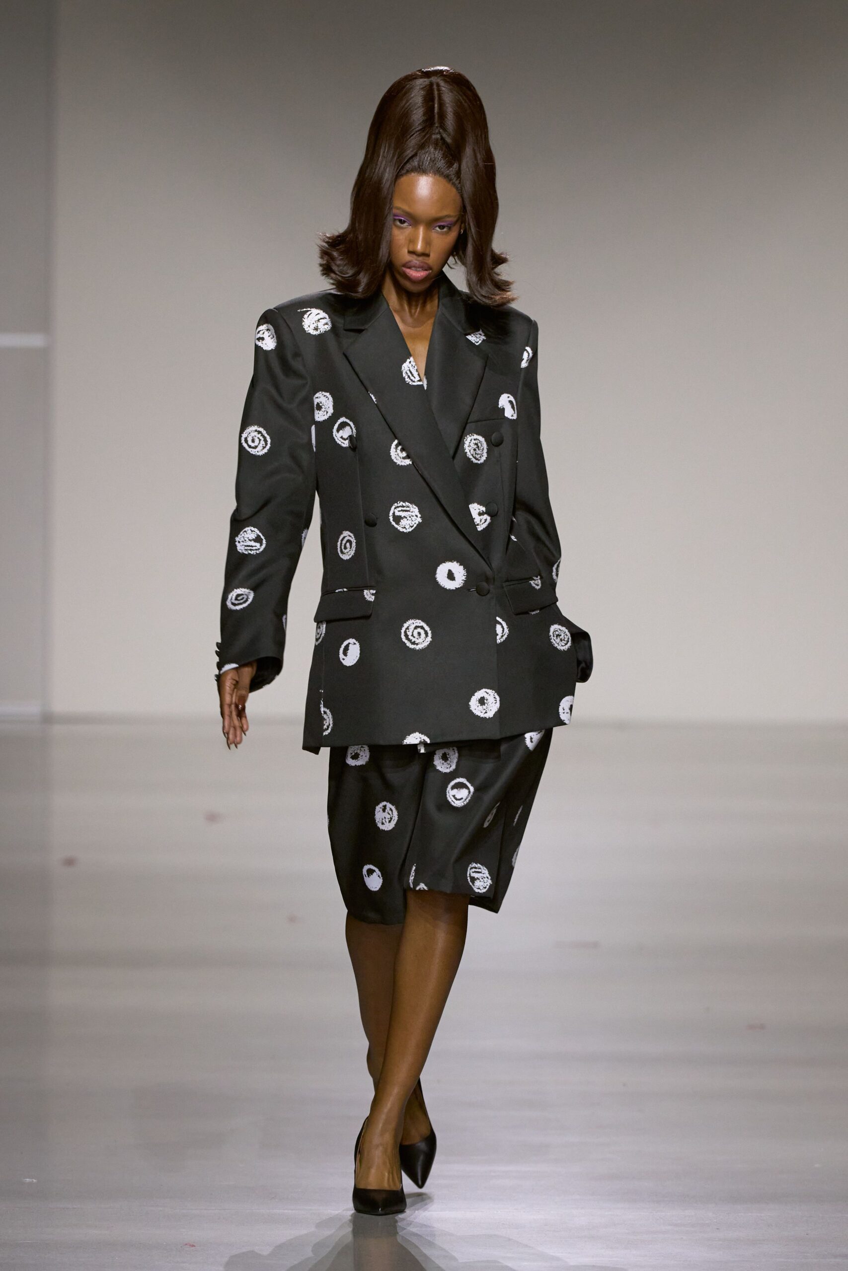 black tailored blazer and skirt