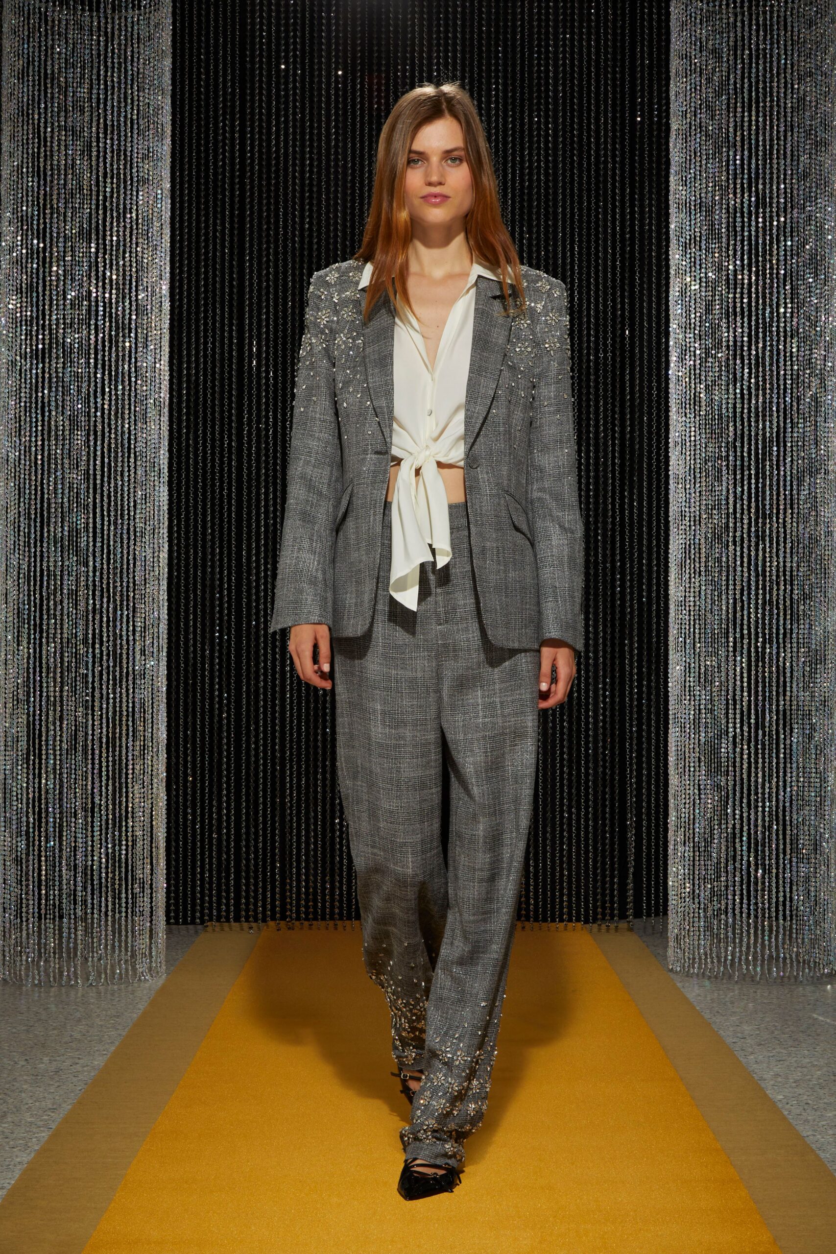 gray tailored blazer with white shirt