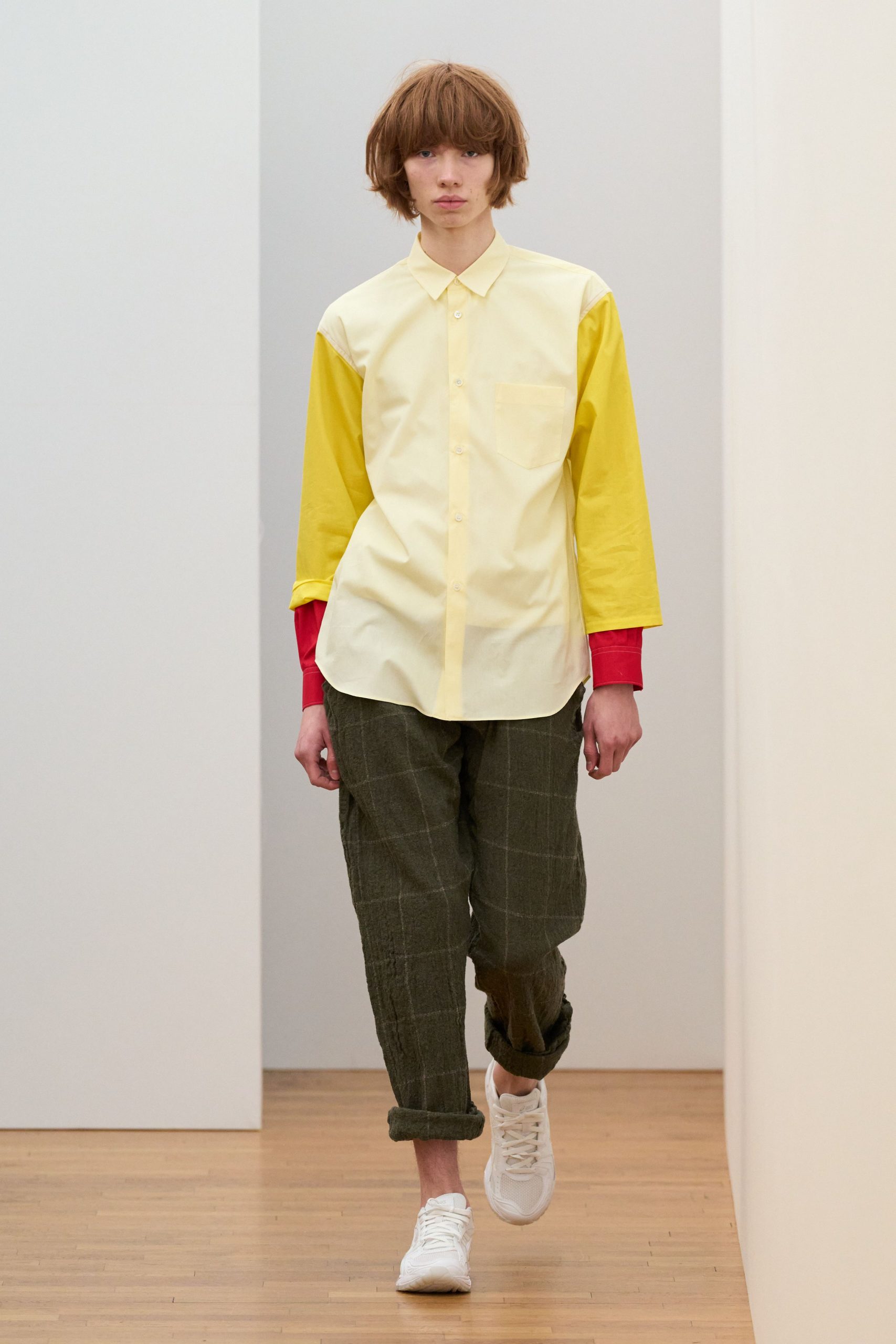 yellow and red relaxed shirt with green checked pants
