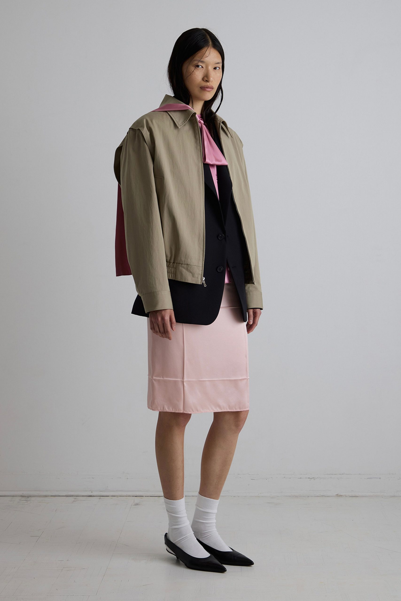 pink silk short-sleeve collared fitted top