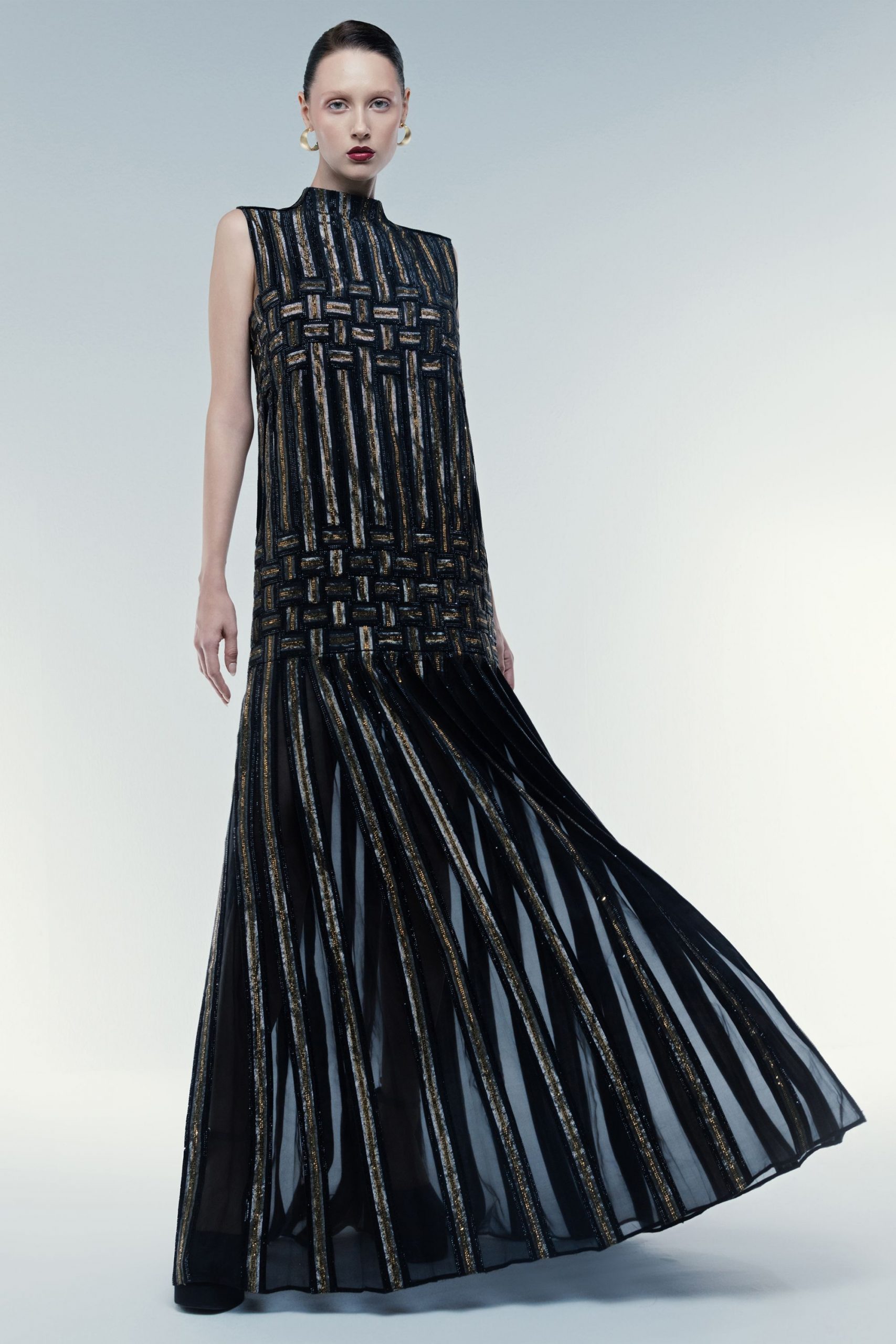 black and gold pleated gown