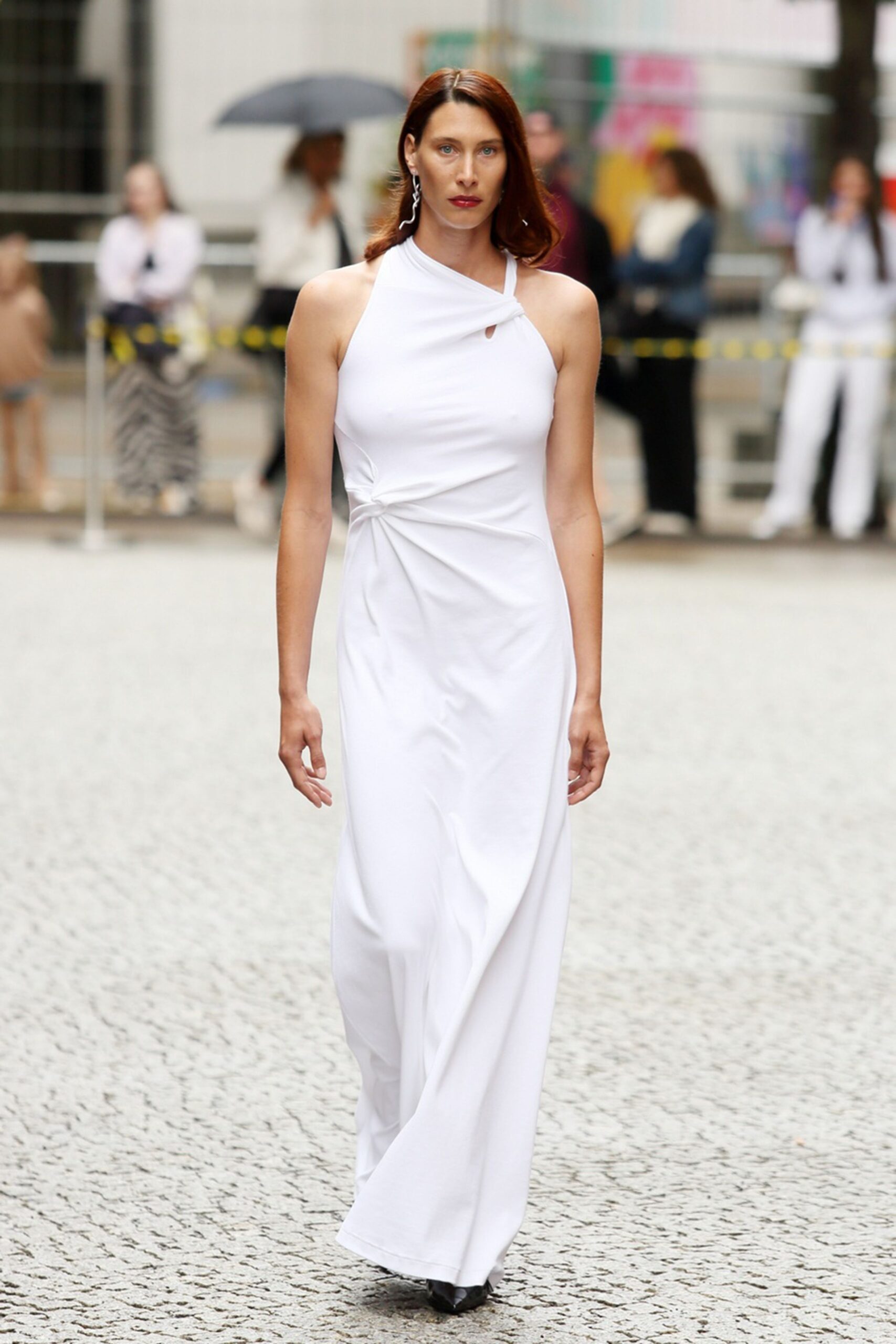 white fitted gown with heels