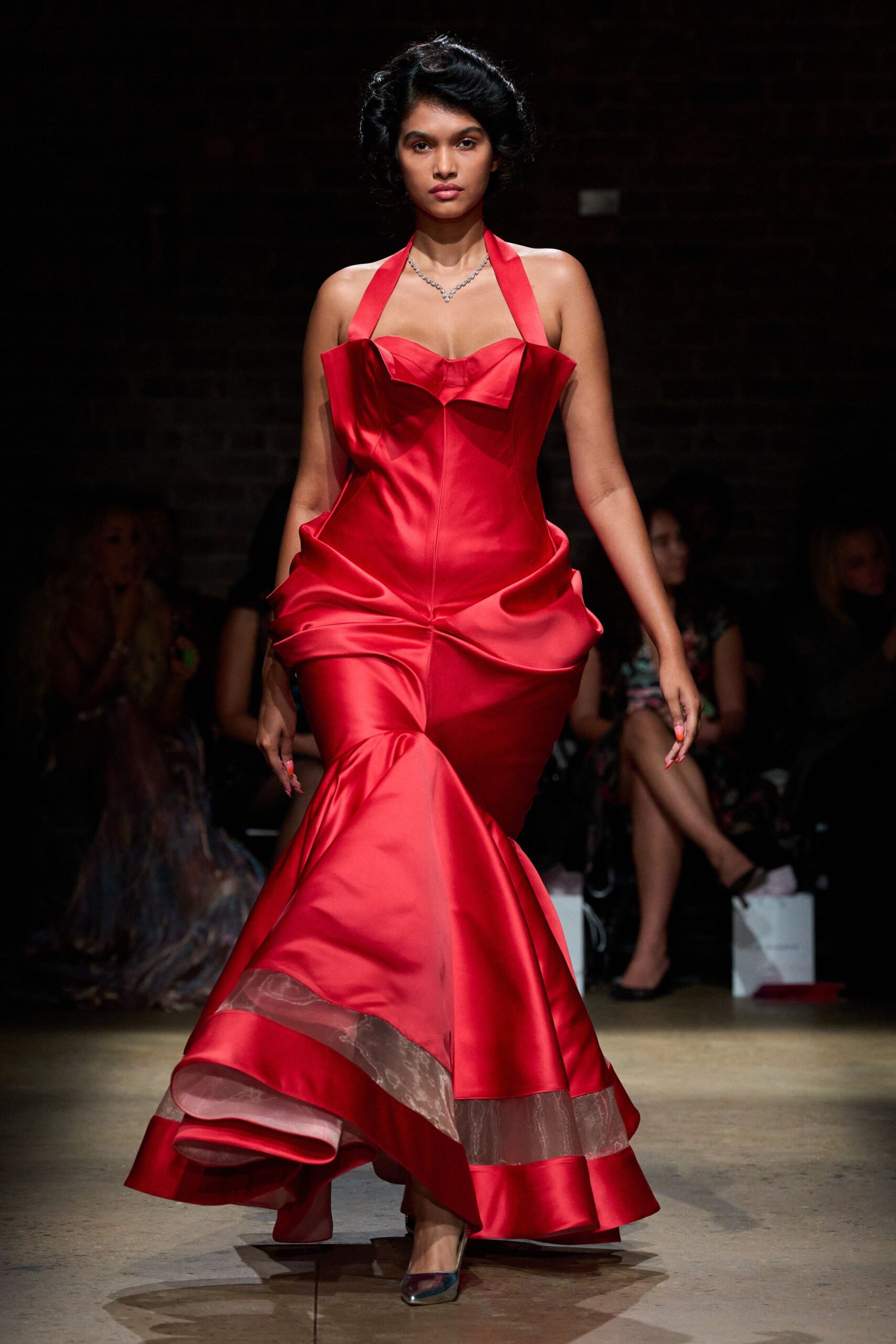 red satin strapless halter fitted pleated flared gown