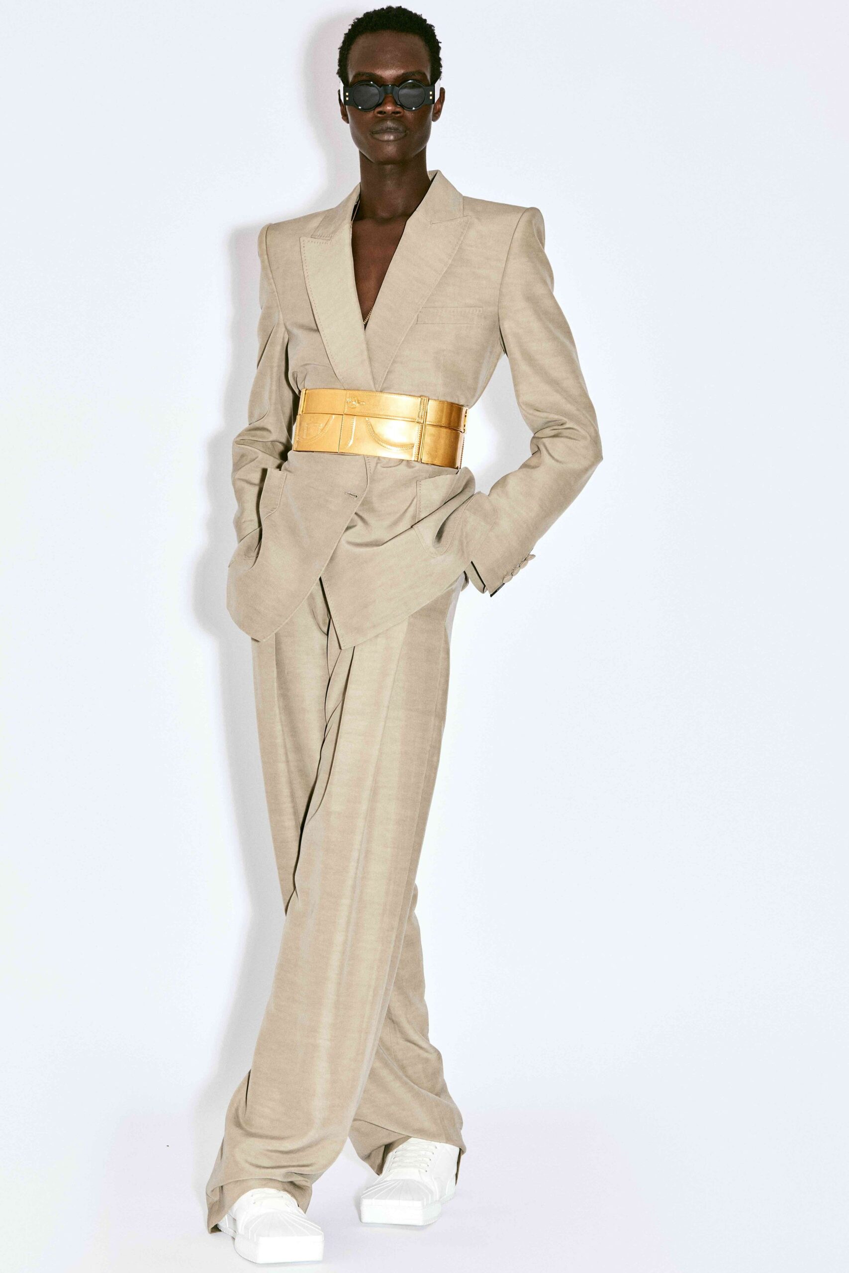 beige cotton long-sleeve v-neck relaxed wide-leg belted jumpsuit