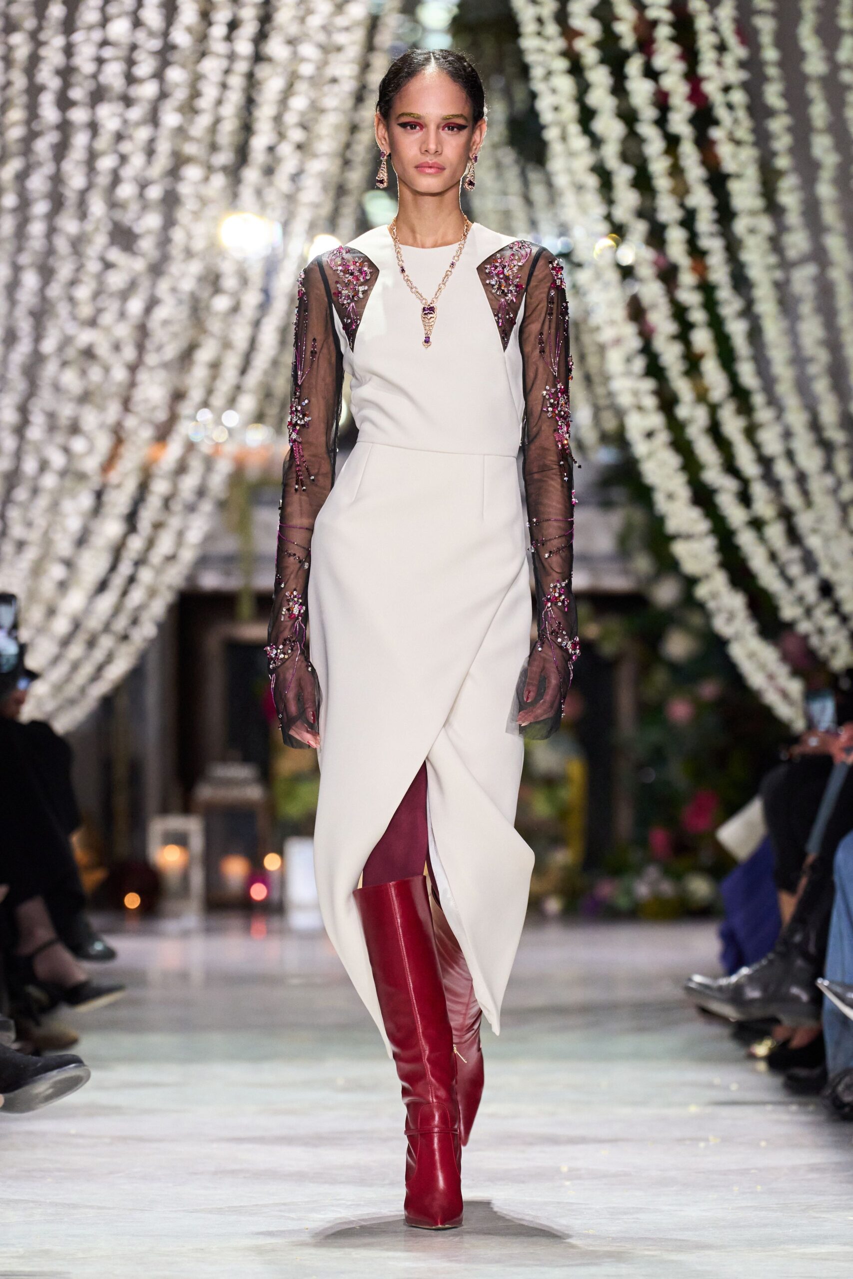 white embroidered midi dress with red boots