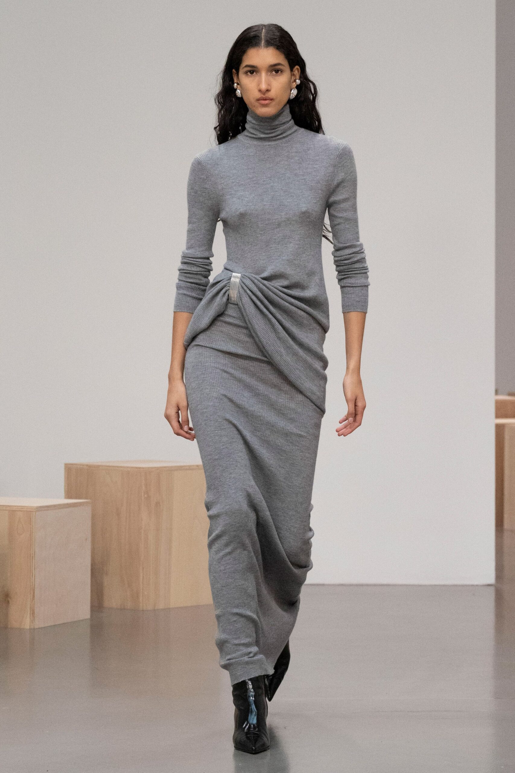 gray knit long-sleeve dress with black boots