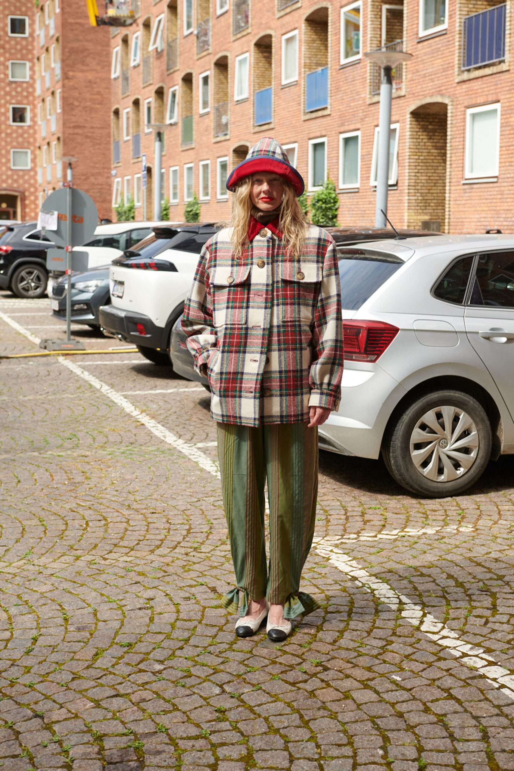 checked jacket with pleated pants