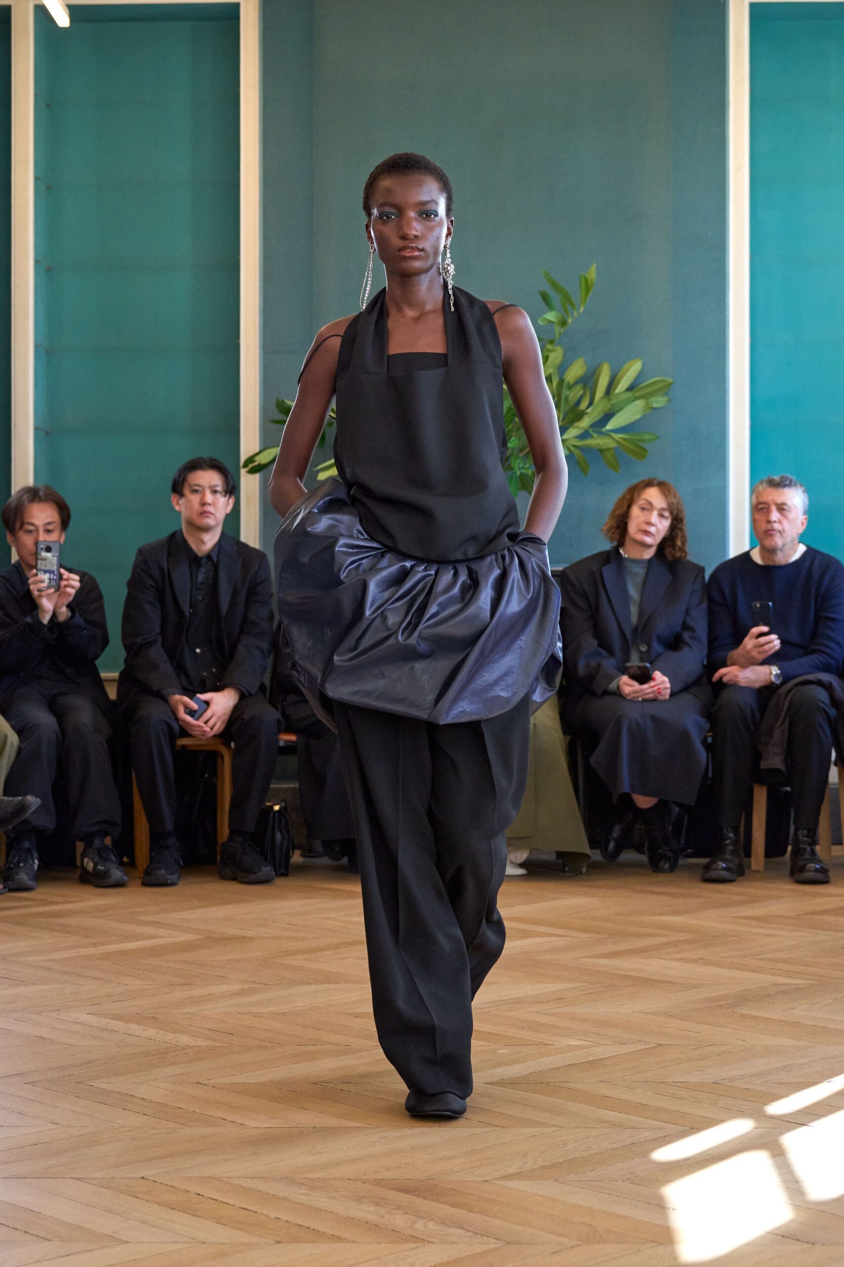 black halter dress with wide-leg pants