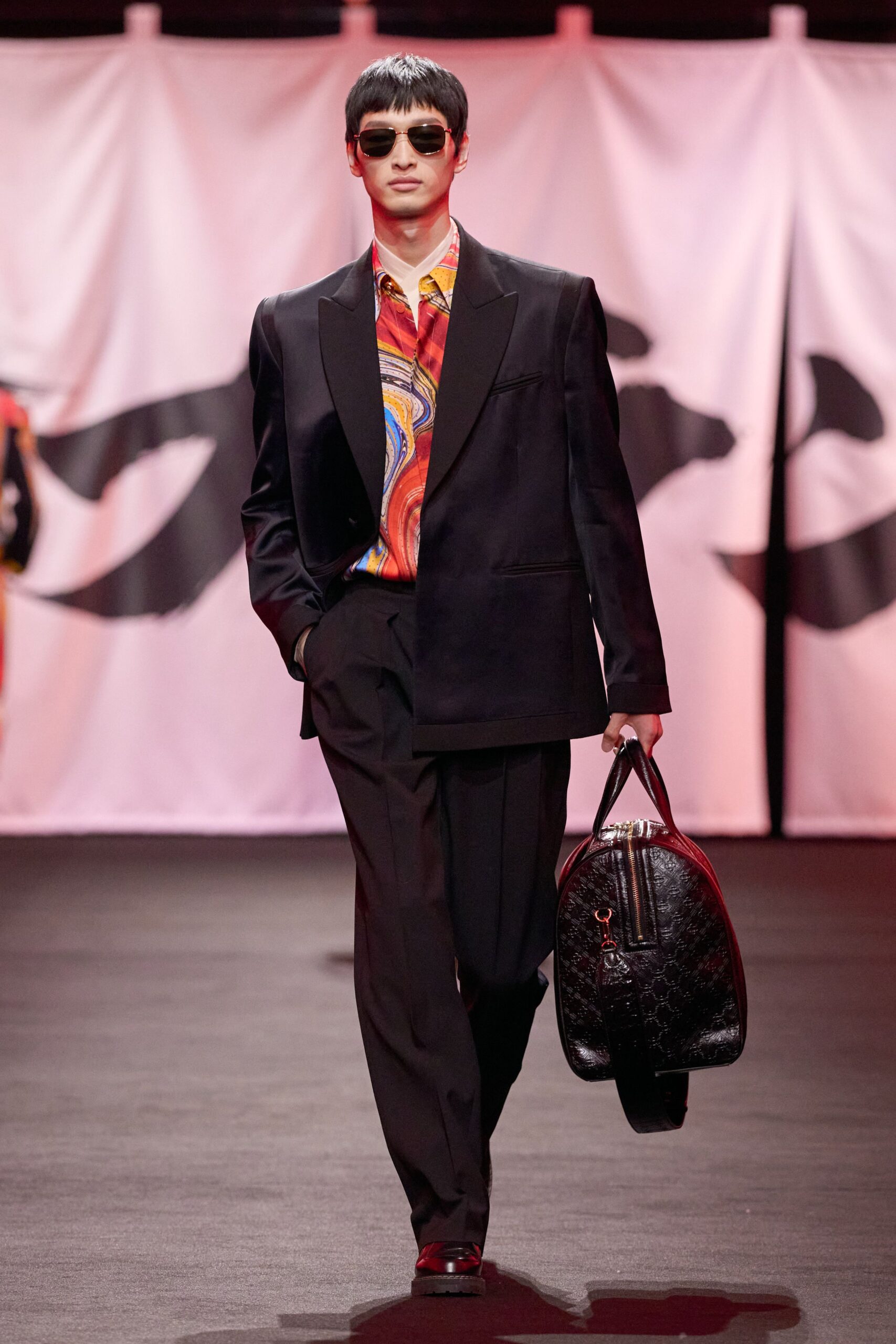 black tailored blazer with multi-colored shirt