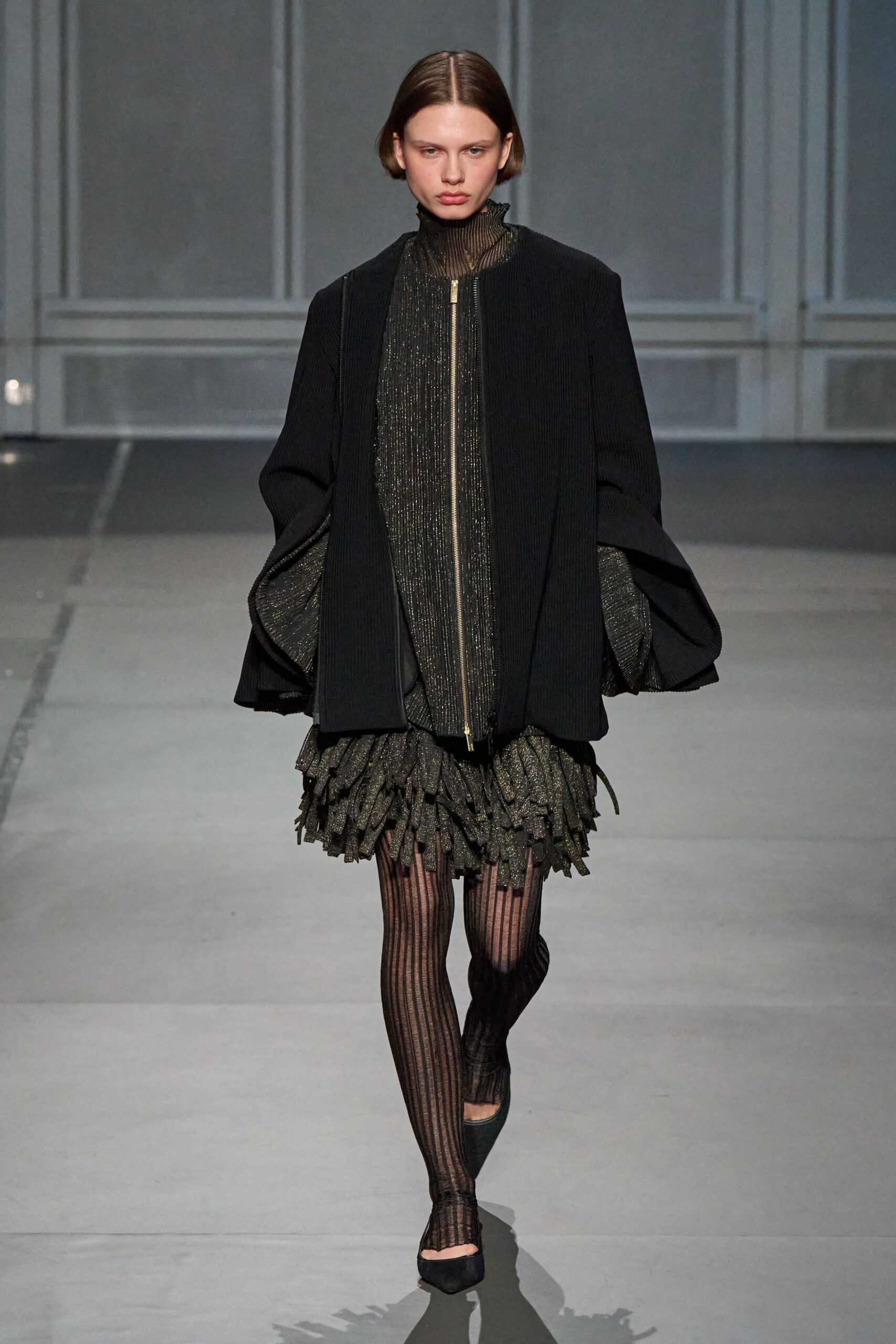 black oversized coat and mini dress