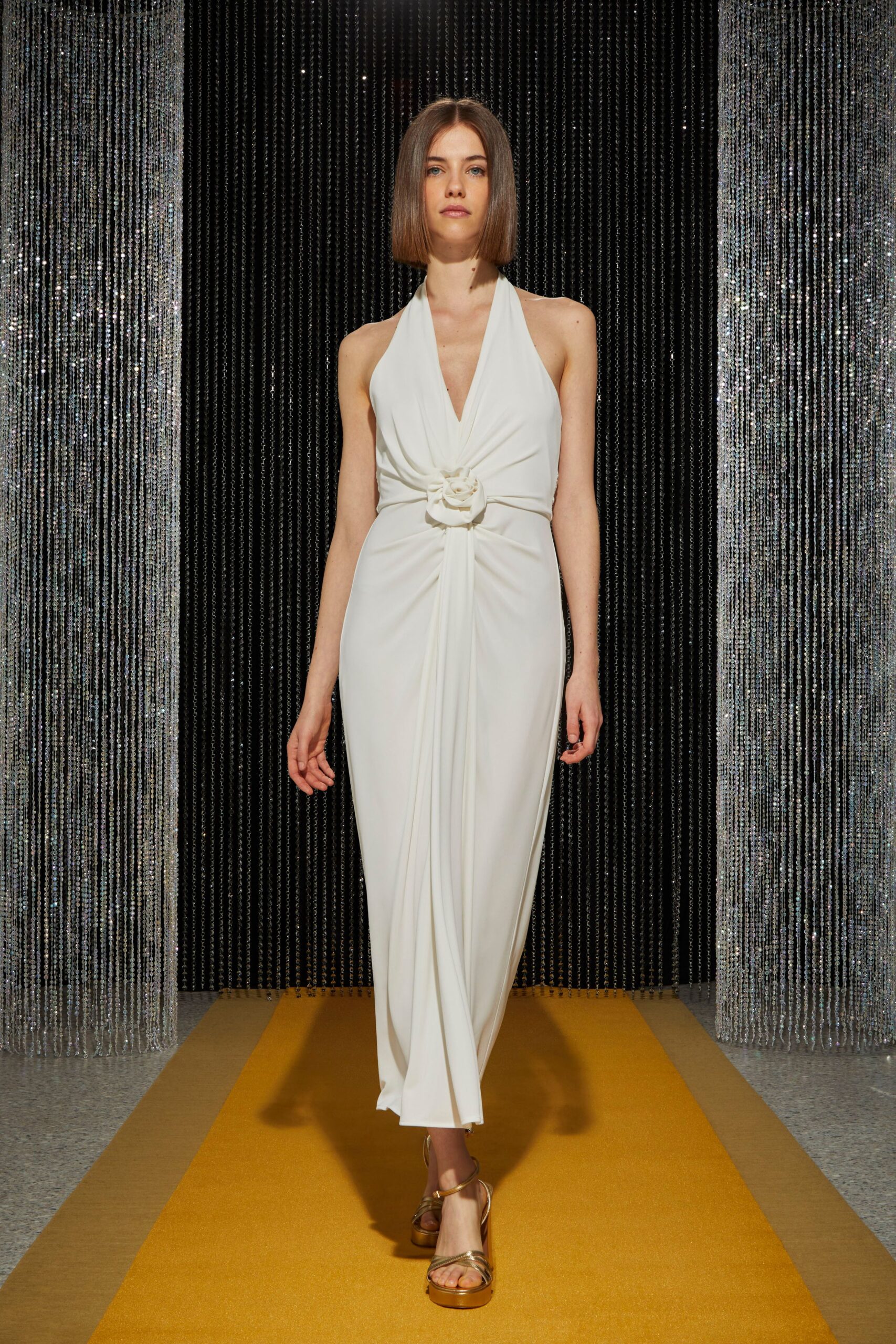 white silk sleeveless v-neck fitted draped belted gown