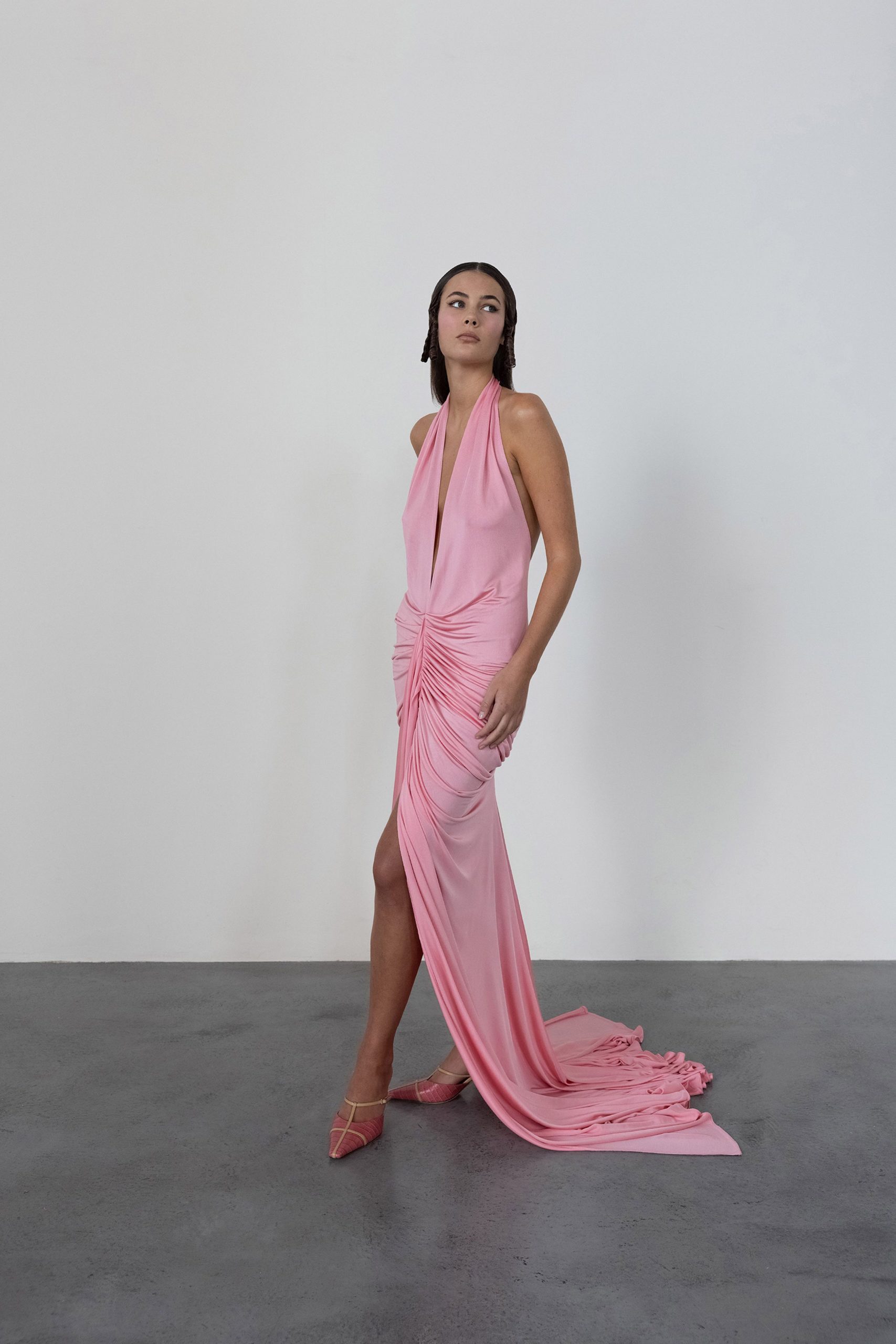 pink silk draped gown with clear shoes