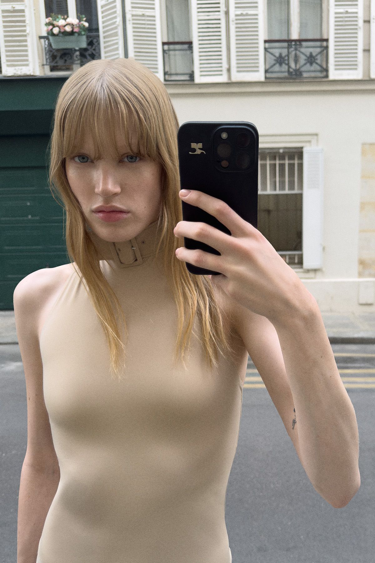 beige fitted sleeveless bodysuit