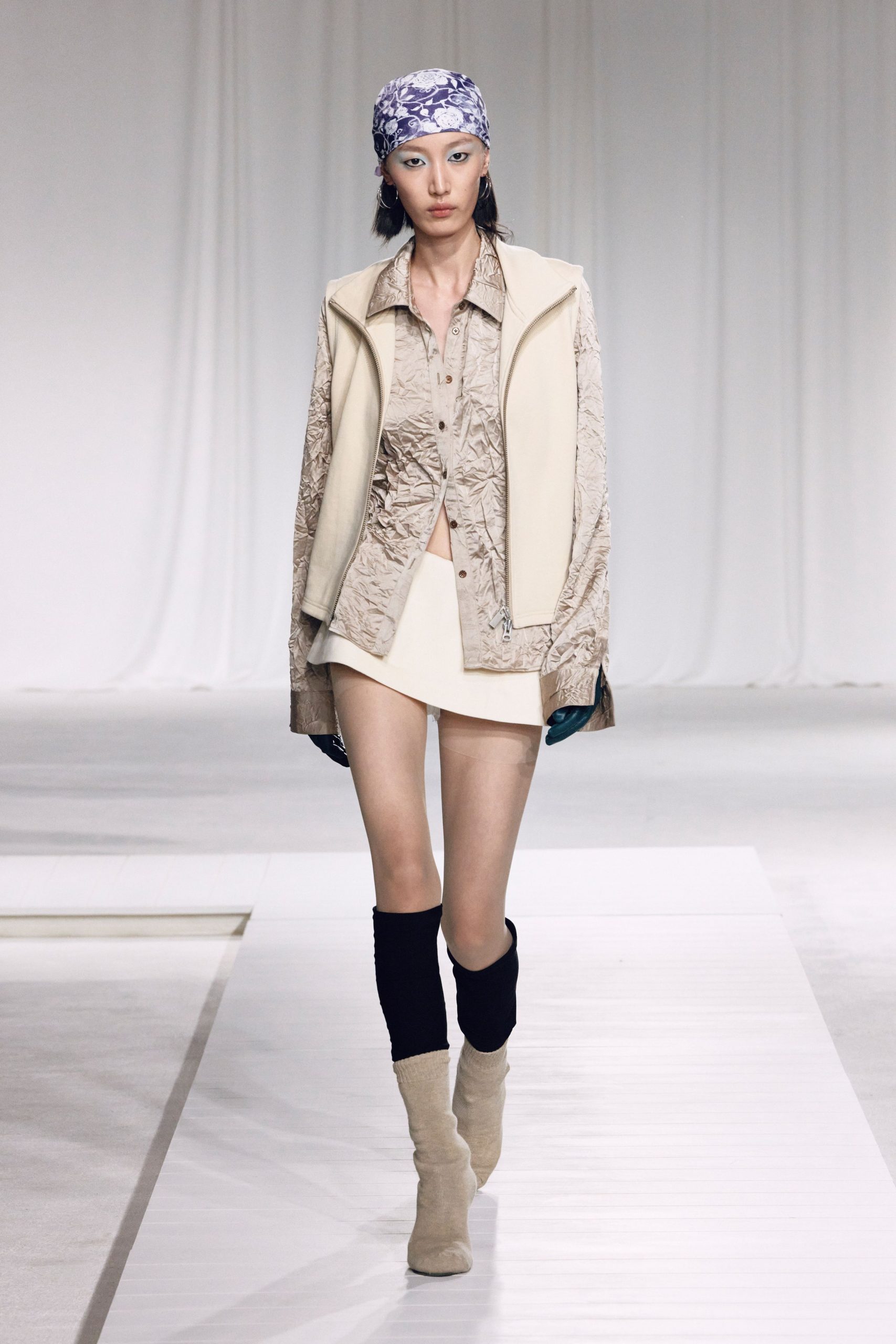 beige embroidered vest and shirt