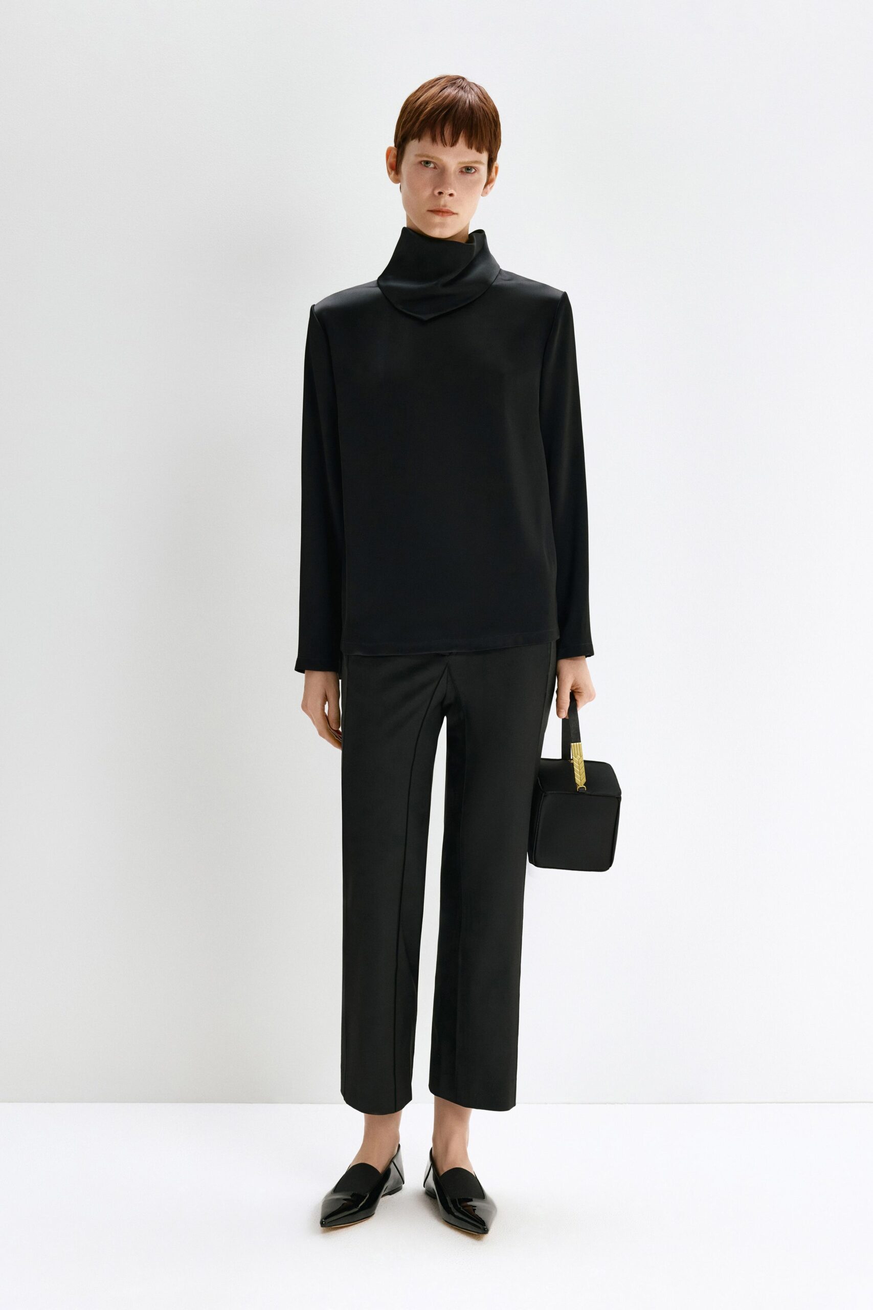 black silk fitted top and pants