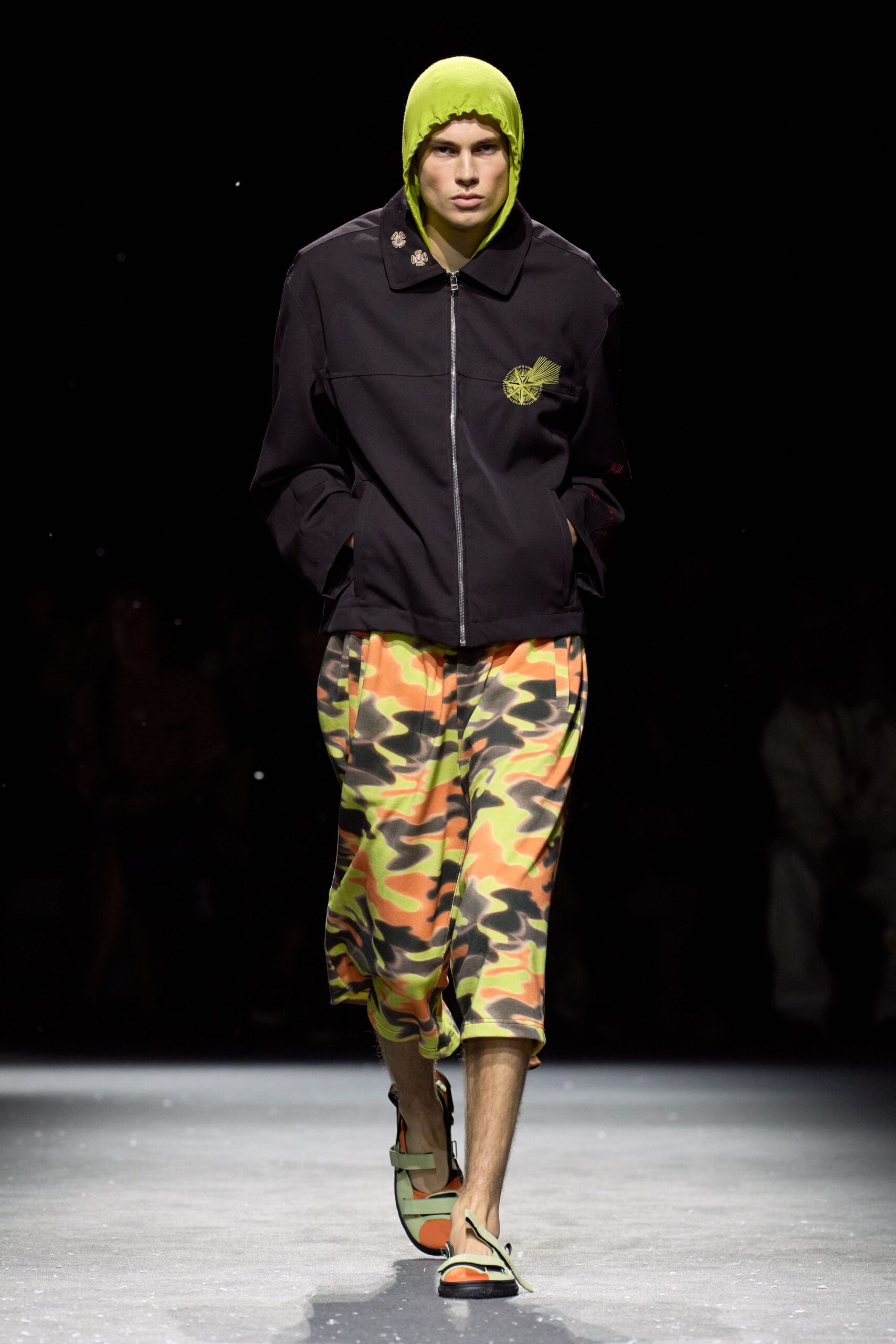 black relaxed jacket with camo pants