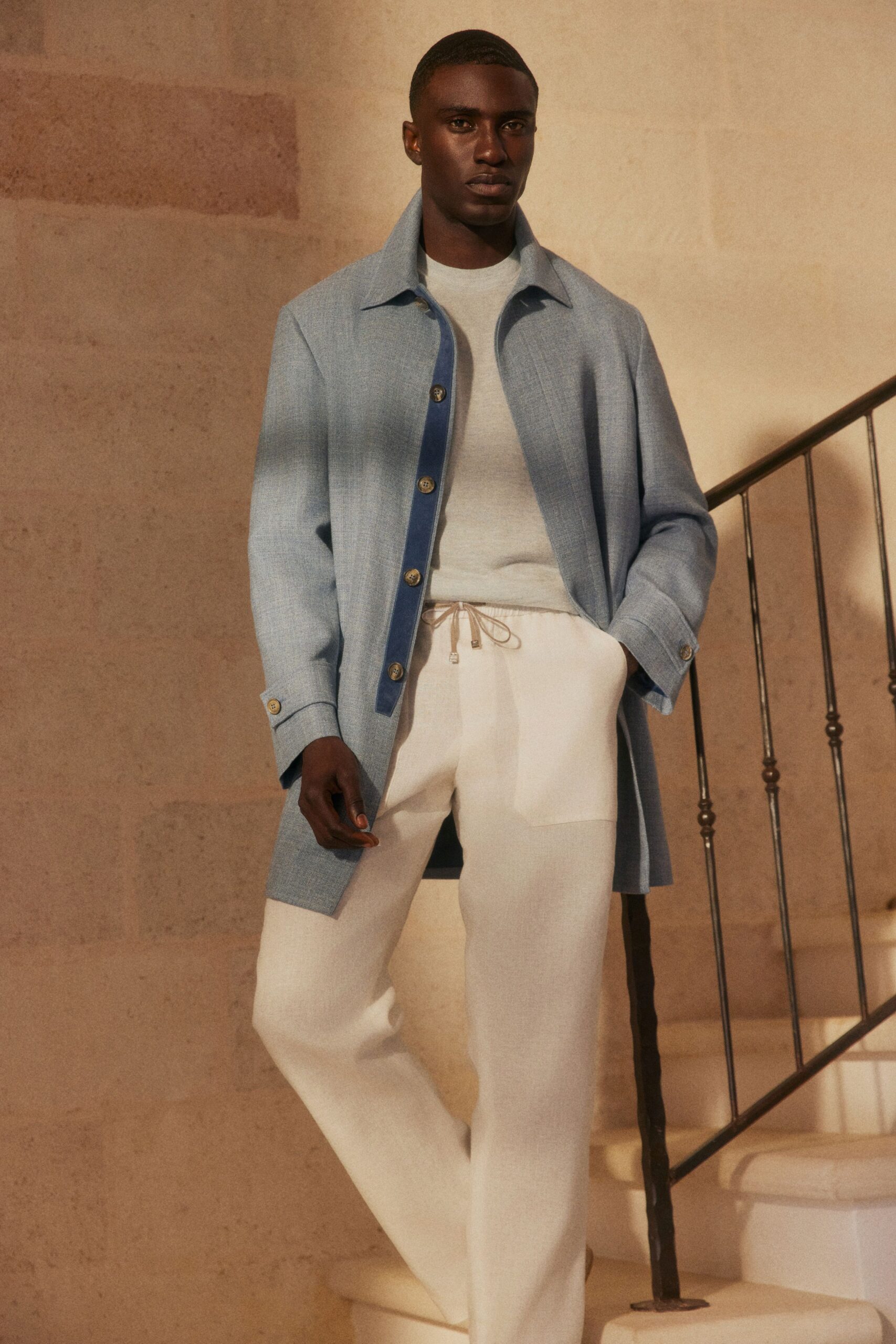 blue wool long-sleeve collared oversized buttoned pockets coat
