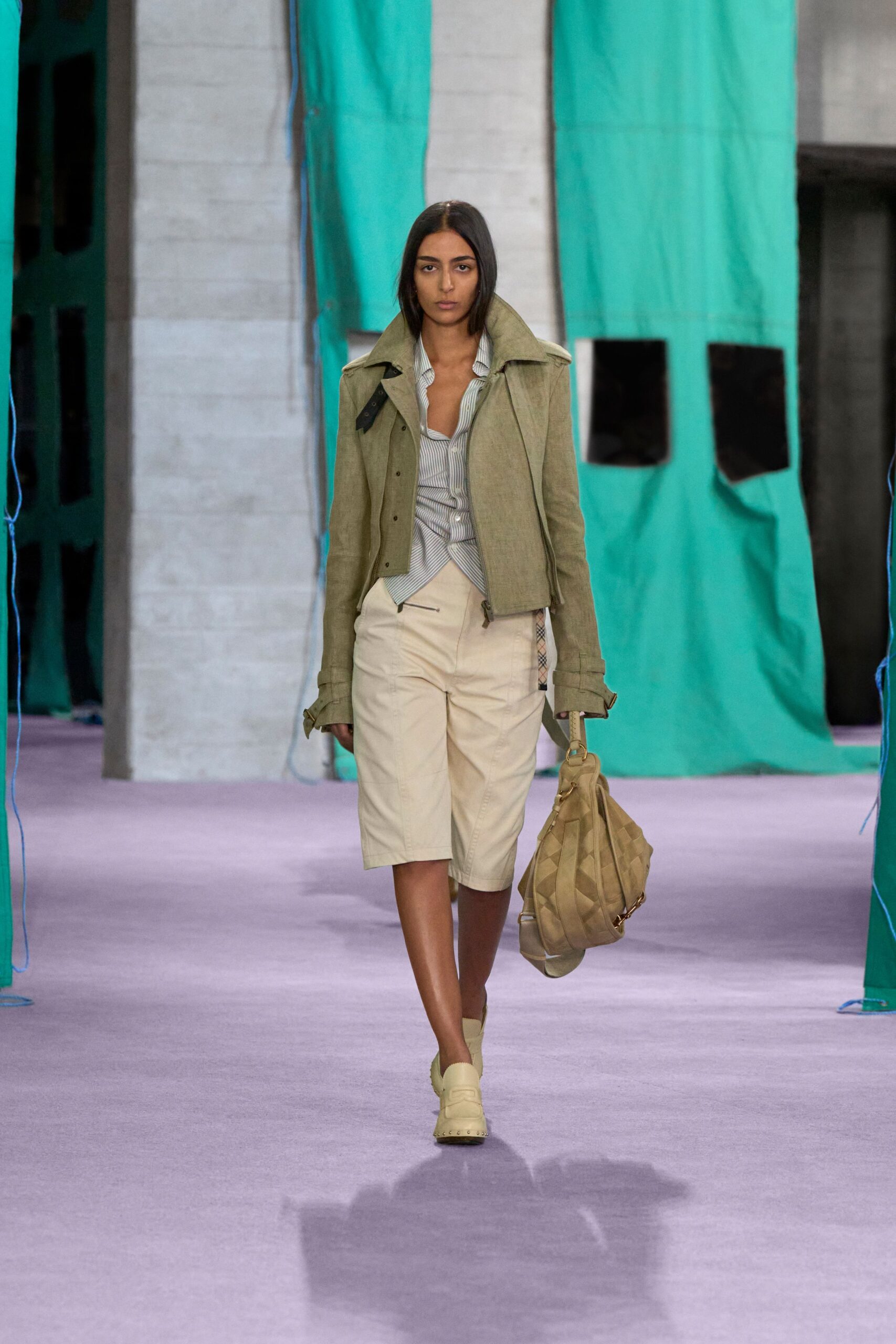 green relaxed jacket with beige shorts