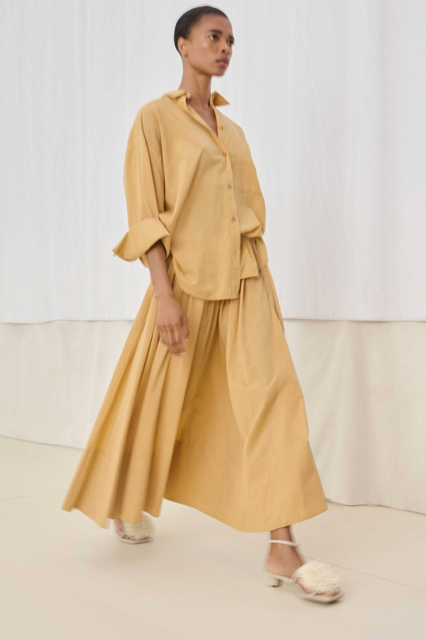 beige cotton relaxed high-waisted pleated maxi skirt
