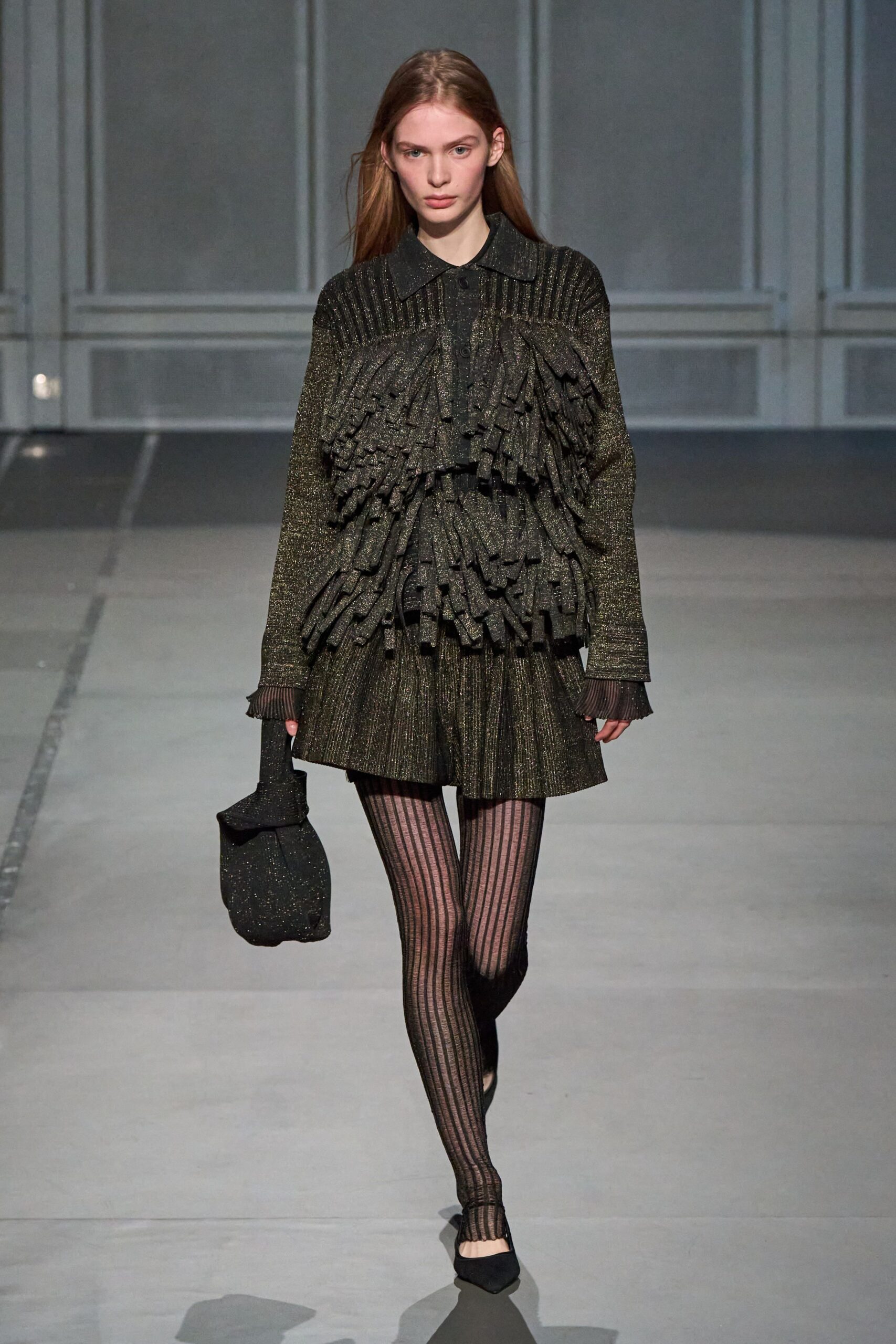 black fringed top and skirt