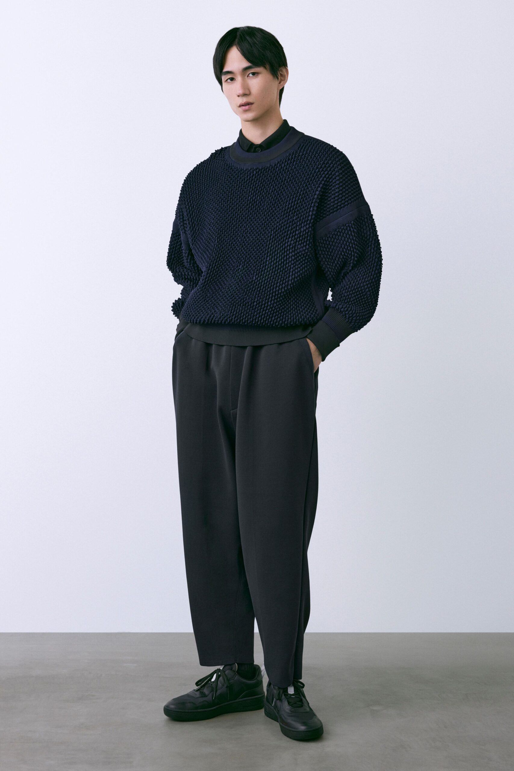 black knit long-sleeve collared oversized textured sweater