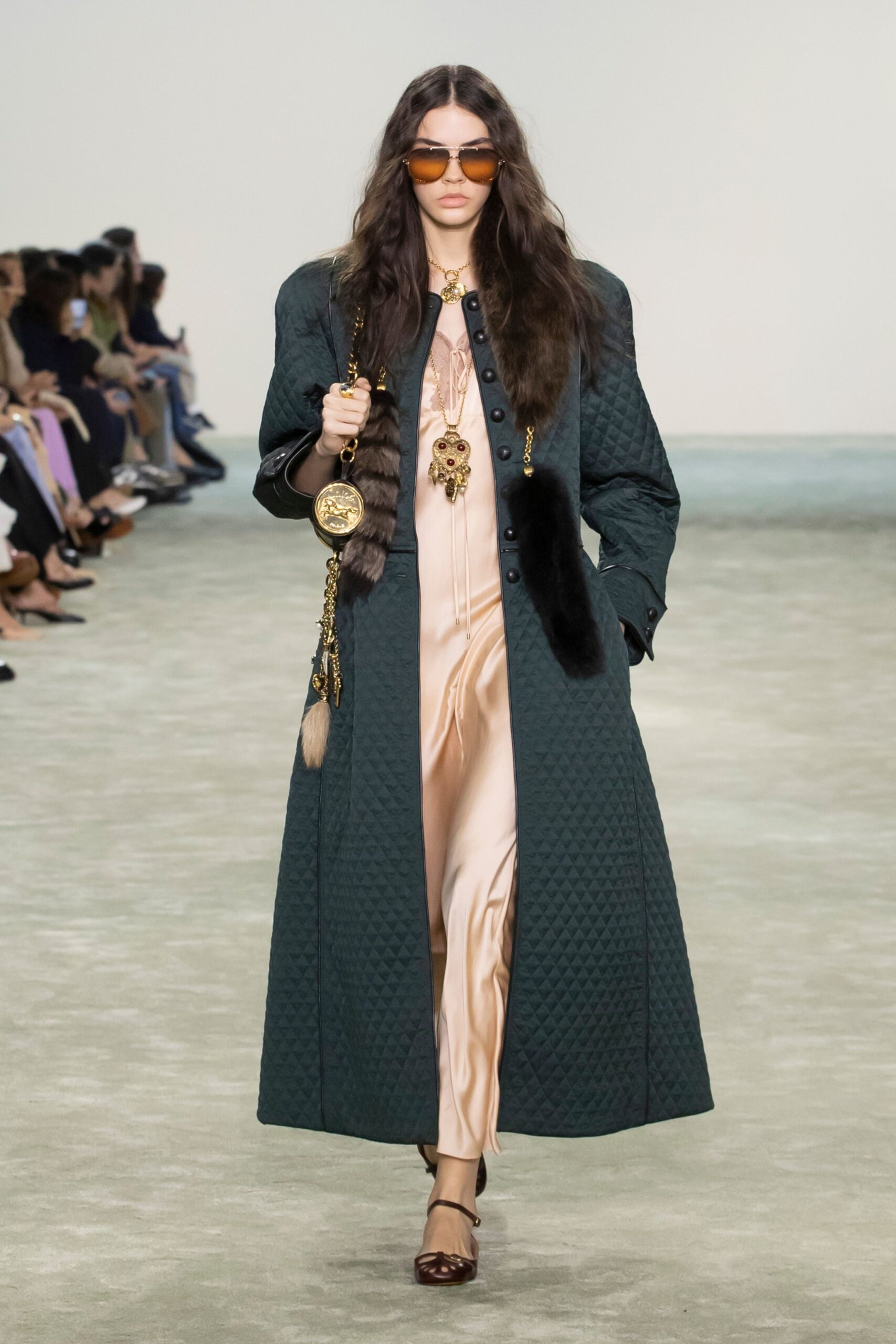 green quilted coat with pink dress