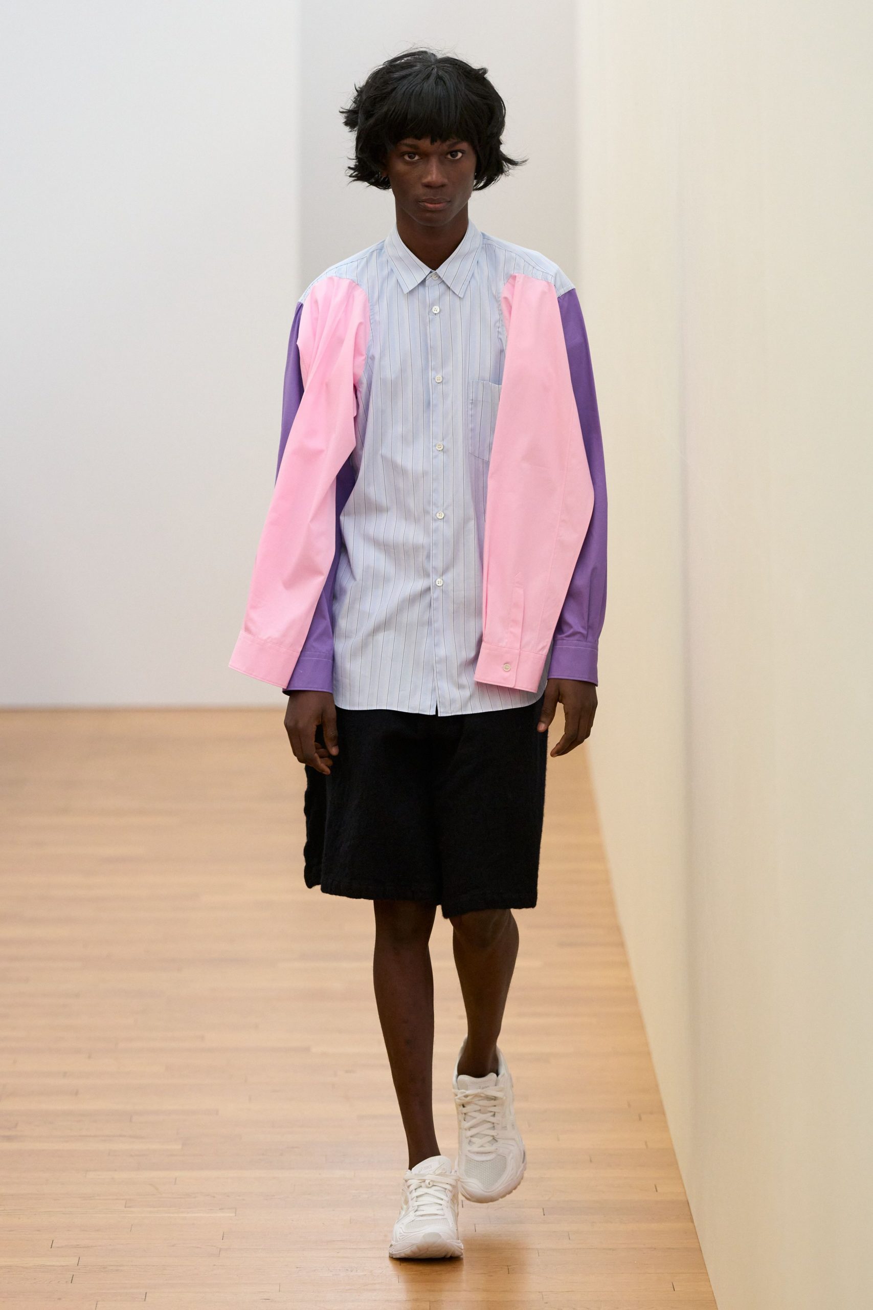 blue and pink relaxed shirt with black shorts