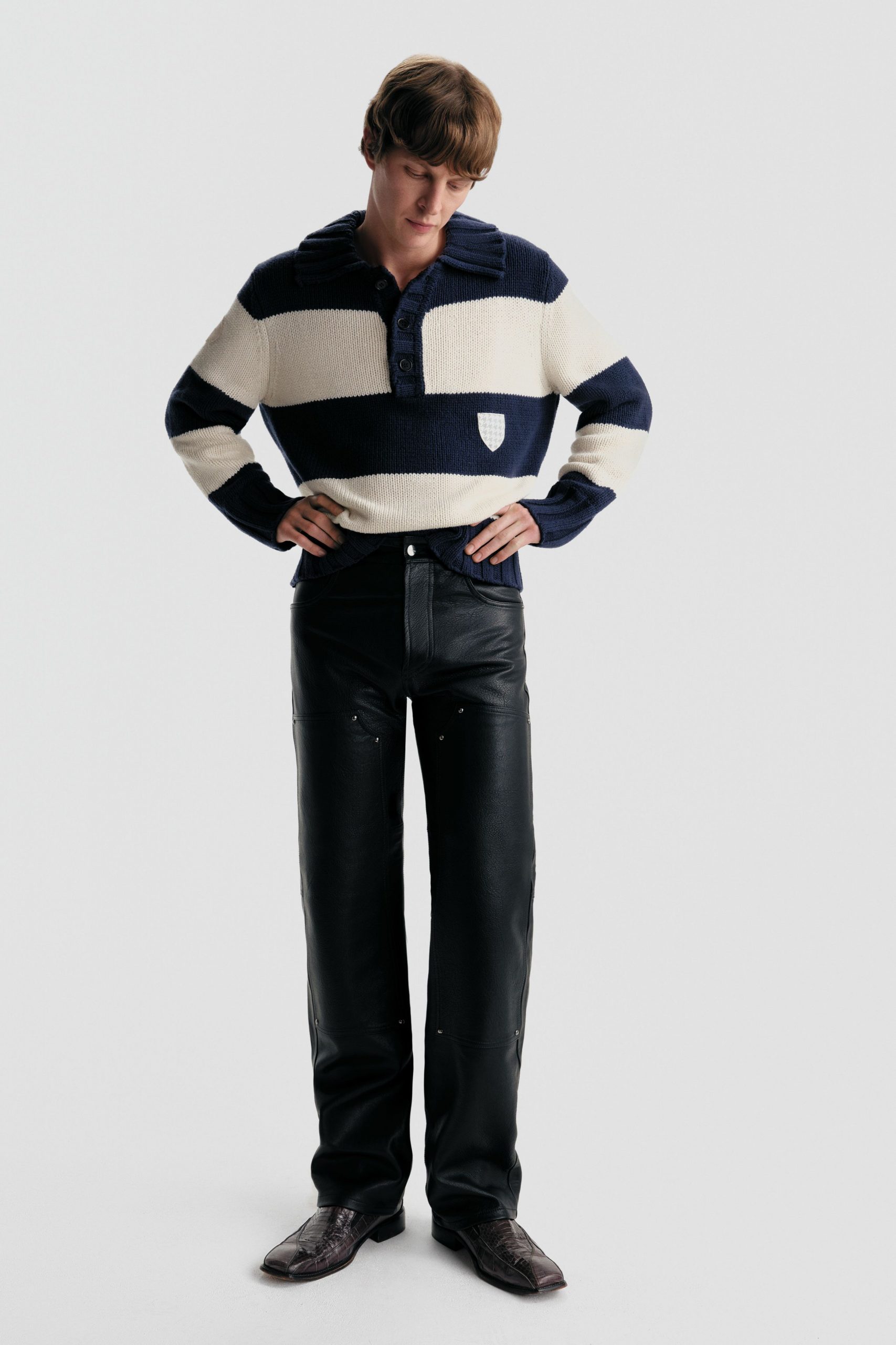 navy and white striped sweater with black leather pants