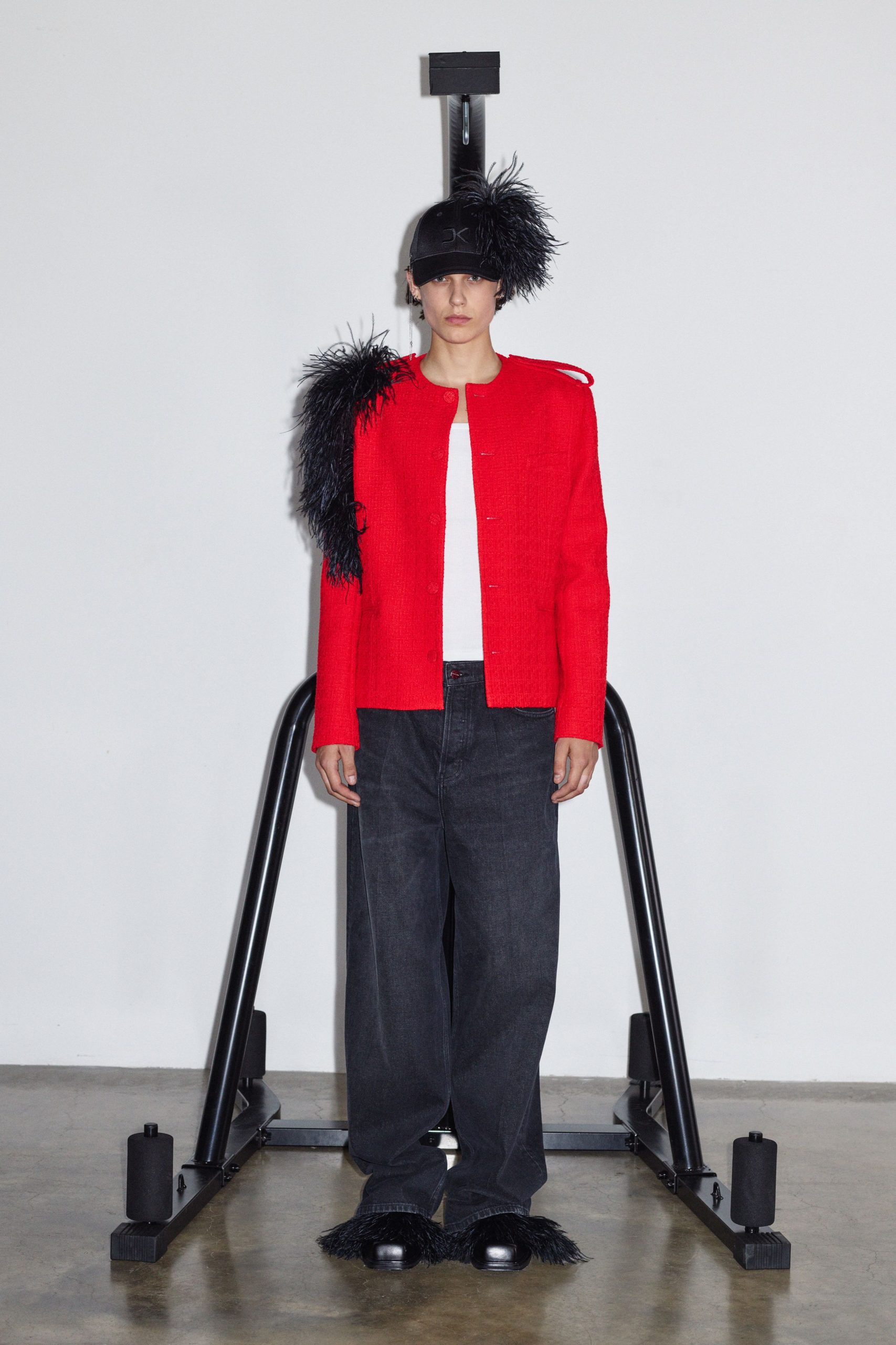 red jacket with fringed details