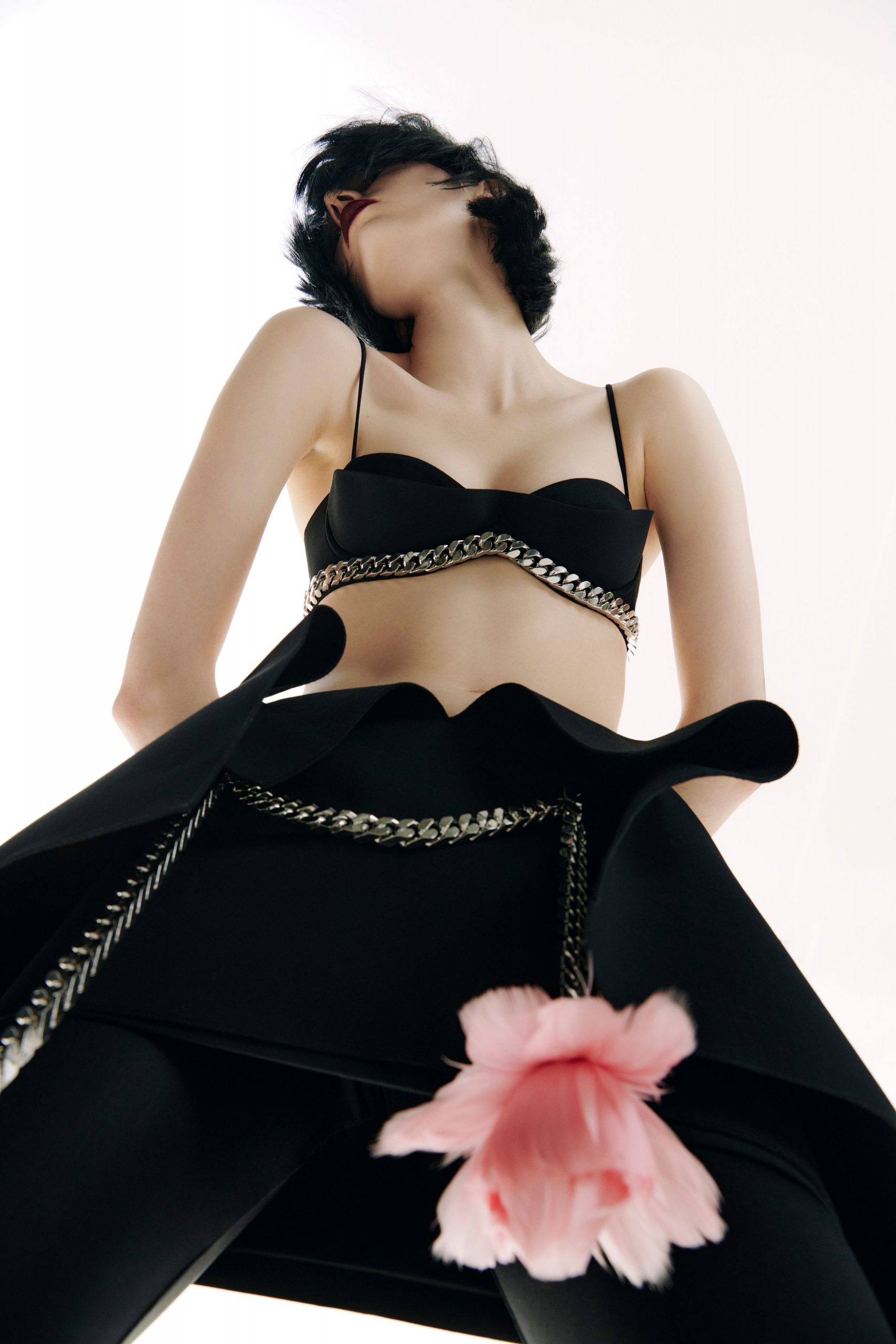 black silk fitted high-waisted flared mini skirt