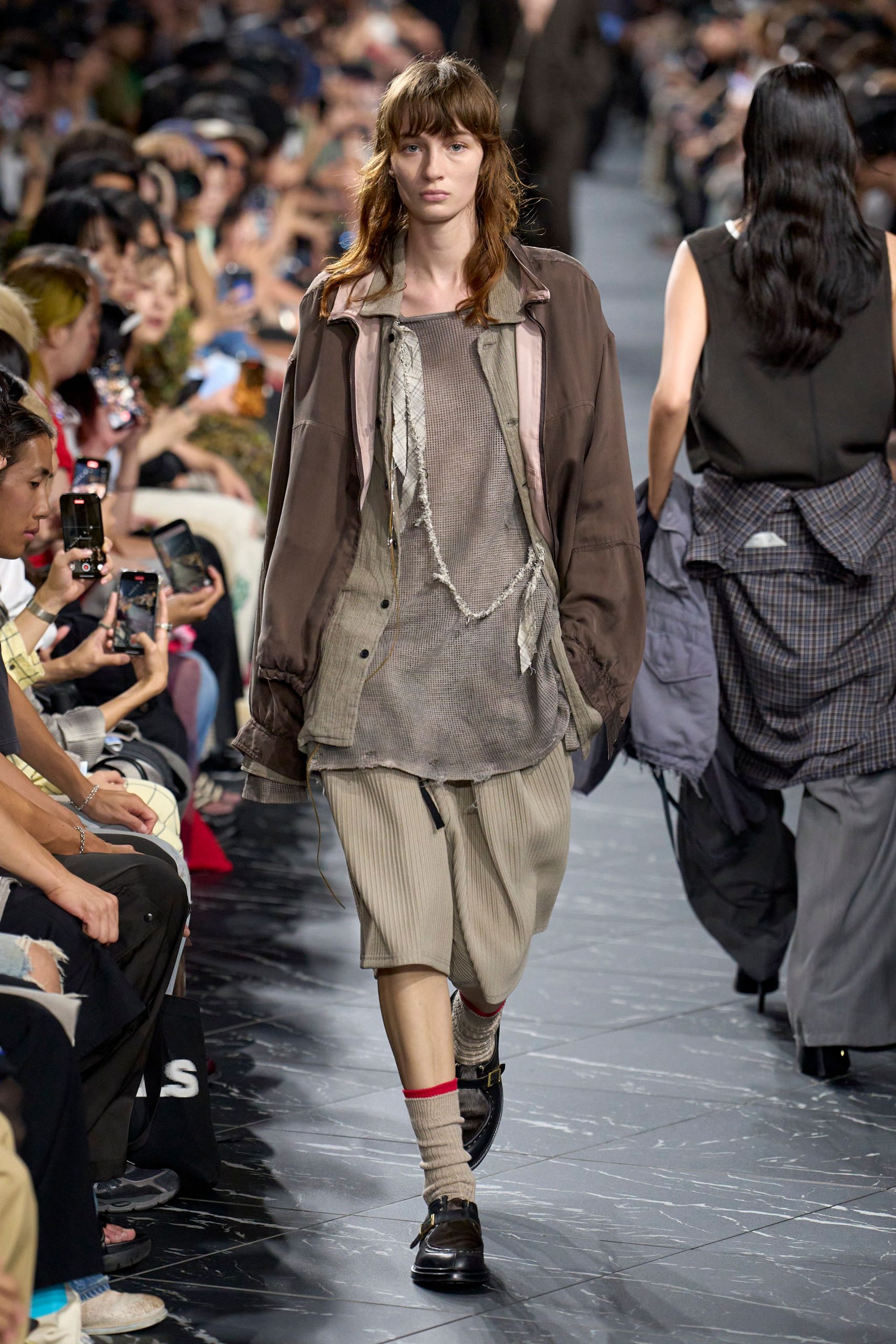 brown relaxed jacket gray top beige shorts