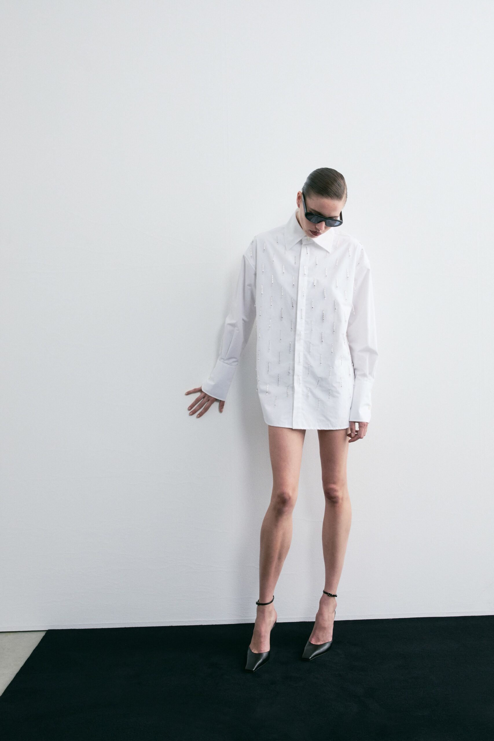 white cotton long-sleeve collared oversized buttoned embellished shirt