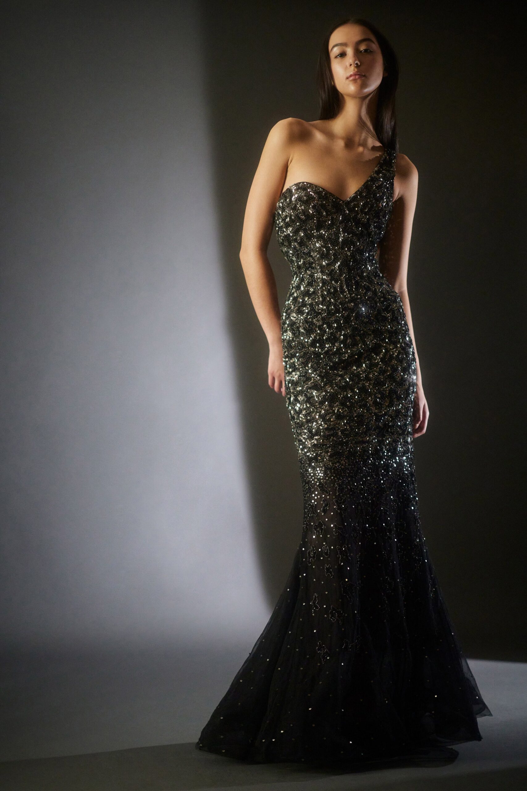 black sequined strapless gown