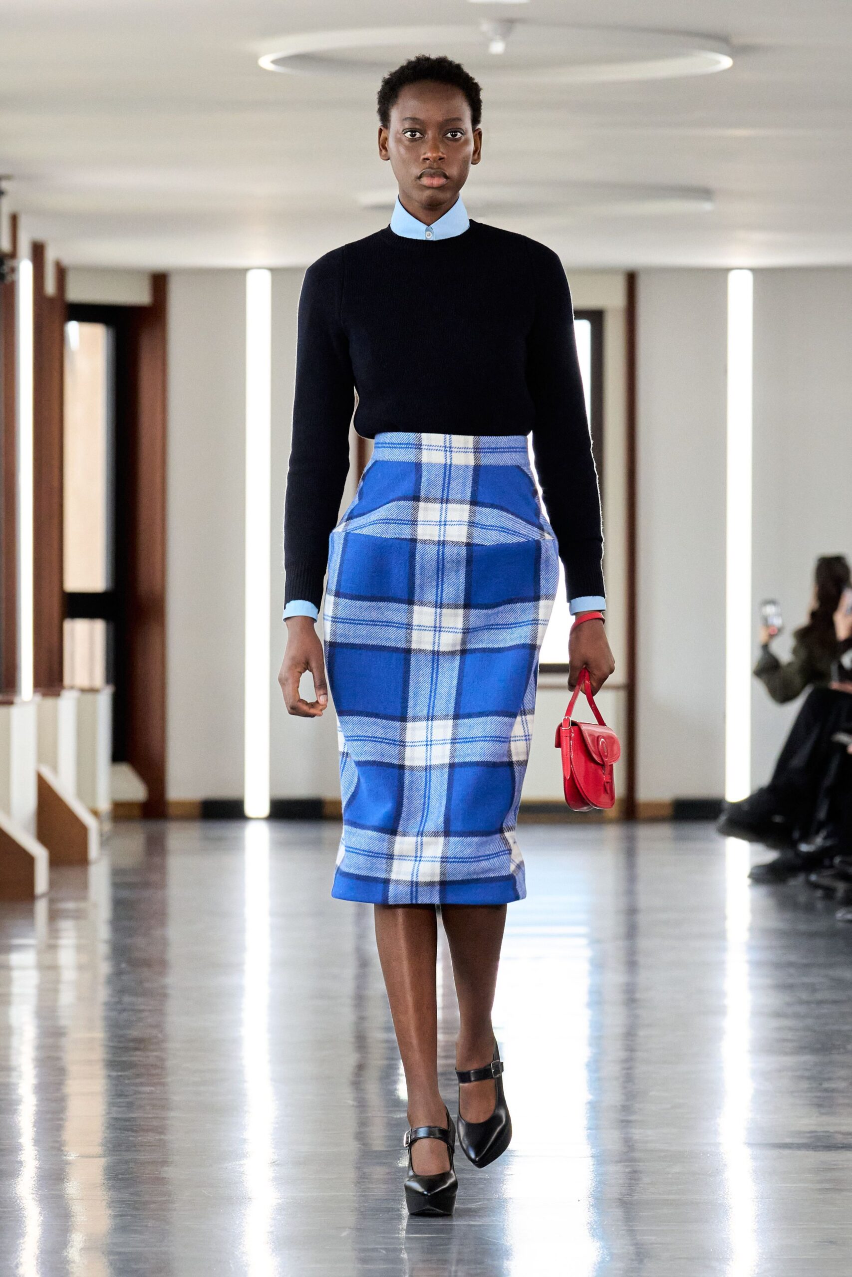 black sweater blue pencil skirt